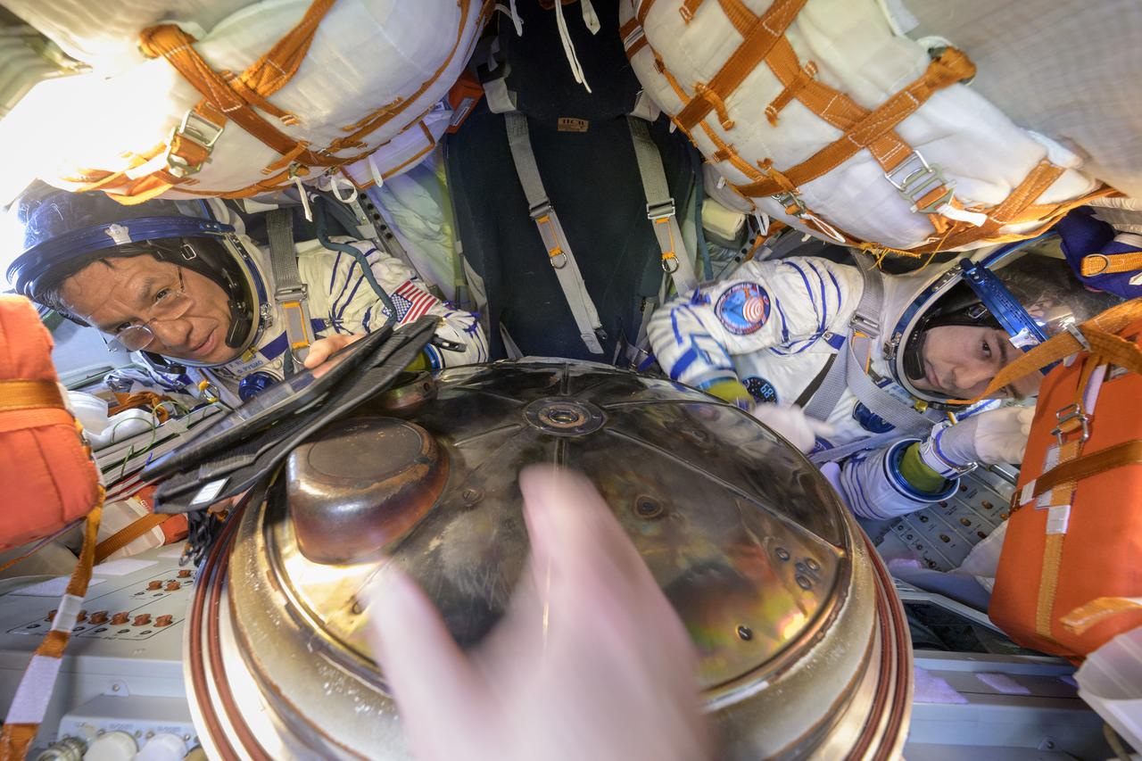 Expedition 69 NASA astronaut Frank Rubio, left, and Roscosmos cosmonaut Dmitri Petelin are seen inside the Soyuz MS-23 spacecraft just minutes after they and Roscosmos cosmonaut Sergey Prokopyev, landed in a remote area near the town of Zhezkazgan, Kazakhstan on Wednesday, Sept. 27, 2023. The trio are returning to Earth after logging 371 days in space as members of Expeditions 68-69 aboard the International Space Station. For Rubio, his mission is the longest single spaceflight by a U.S. astronaut in history. Photo Credit: (NASA/Bill Ingalls)