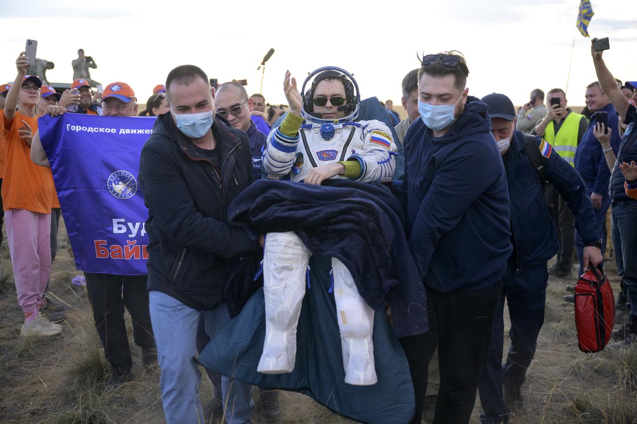 Expedition 69 Roscosmos cosmonaut Dmitri Petelin is carried to a medical tent shortly after he, NASA astronaut Frank Rubio, and Roscosmos cosmonaut Sergey Prokopyev landed in their Soyuz MS-23 spacecraft near the town of Zhezkazgan, Kazakhstan on Wednesday, Sept. 27, 2023. The trio are returning to Earth after logging 371 days in space as members of Expeditions 68-69 aboard the International Space Station. For Rubio, his mission is the longest single spaceflight by a U.S. astronaut in history. Photo Credit: (NASA/Bill Ingalls)