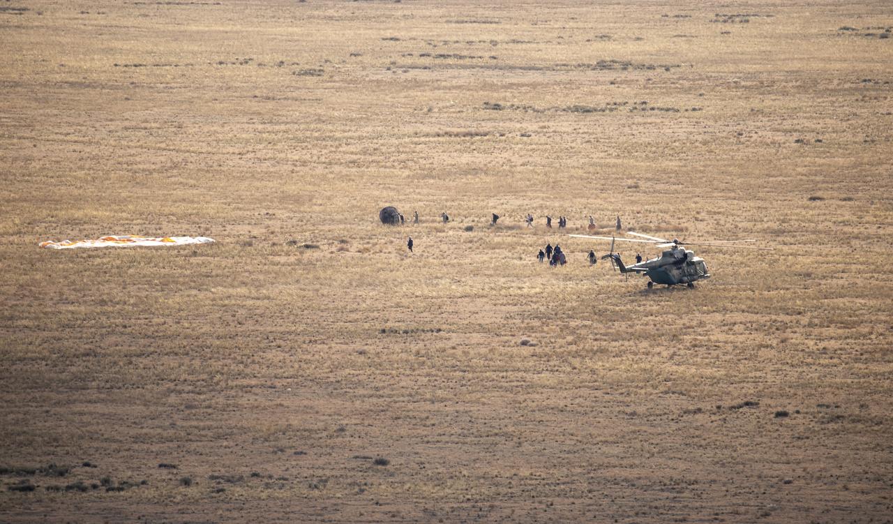 Russian Search and Rescue teams arrive at the Soyuz MS-23 spacecraft shortly after it landed in a remote area near the town of Zhezkazgan, Kazakhstan with Expedition 69 NASA astronaut Frank Rubio, Roscosmos cosmonauts Dmitri Petelin and Sergey Prokopyev, Wednesday, Sept. 27, 2023. The trio are returning to Earth after logging 371 days in space as members of Expeditions 68-69 aboard the International Space Station. For Rubio, his mission is the longest single spaceflight by a U.S. astronaut in history. Photo Credit: (NASA/GCTC/Pavel Shvets)