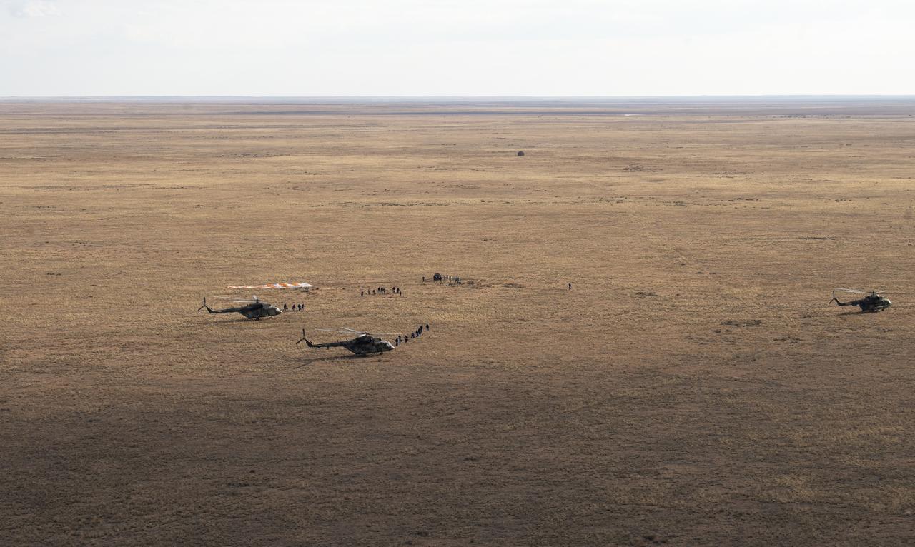 Russian Search and Rescue teams arrive at the Soyuz MS-23 spacecraft shortly after it landed in a remote area near the town of Zhezkazgan, Kazakhstan with Expedition 69 NASA astronaut Frank Rubio, Roscosmos cosmonauts Dmitri Petelin and Sergey Prokopyev, Wednesday, Sept. 27, 2023. The trio are returning to Earth after logging 371 days in space as members of Expeditions 68-69 aboard the International Space Station. For Rubio, his mission is the longest single spaceflight by a U.S. astronaut in history. Photo Credit: (NASA/GCTC/Pavel Shvets)