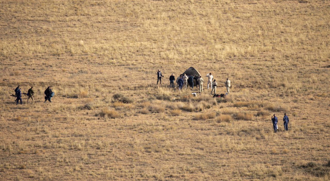 Russian Search and Rescue teams arrive at the Soyuz MS-23 spacecraft shortly after it landed in a remote area near the town of Zhezkazgan, Kazakhstan with Expedition 69 NASA astronaut Frank Rubio, Roscosmos cosmonauts Dmitri Petelin and Sergey Prokopyev, Wednesday, Sept. 27, 2023. The trio are returning to Earth after logging 371 days in space as members of Expeditions 68-69 aboard the International Space Station. For Rubio, his mission is the longest single spaceflight by a U.S. astronaut in history. Photo Credit: (NASA/GCTC/Pavel Shvets)