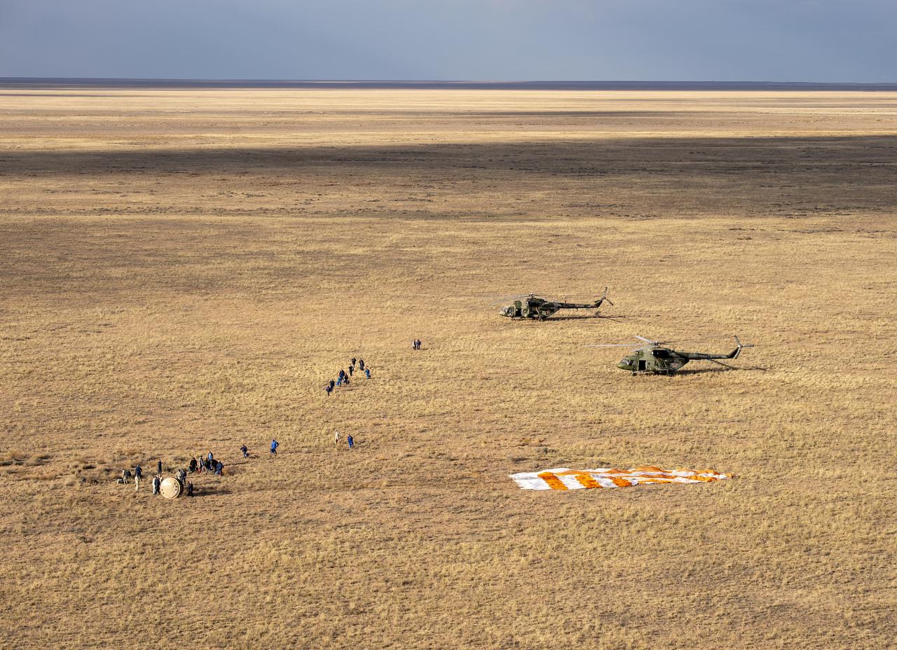 Russian Search and Rescue teams arrive at the Soyuz MS-23 spacecraft shortly after it landed in a remote area near the town of Zhezkazgan, Kazakhstan with Expedition 69 NASA astronaut Frank Rubio, Roscosmos cosmonauts Dmitri Petelin and Sergey Prokopyev, Wednesday, Sept. 27, 2023. The trio are returning to Earth after logging 371 days in space as members of Expeditions 68-69 aboard the International Space Station. For Rubio, his mission is the longest single spaceflight by a U.S. astronaut in history. Photo Credit: (NASA/GCTC/Pavel Shvets)