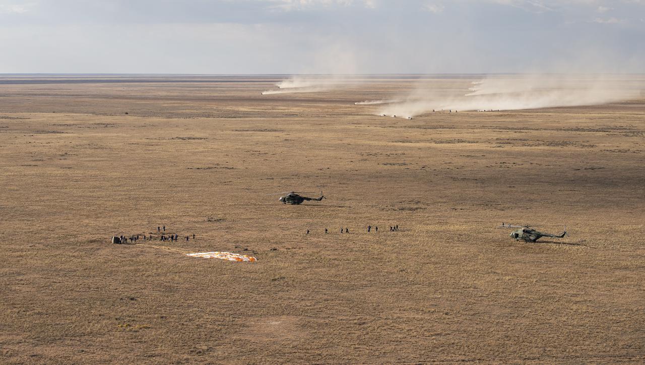 Russian Search and Rescue teams arrive at the Soyuz MS-23 spacecraft shortly after it landed in a remote area near the town of Zhezkazgan, Kazakhstan with Expedition 69 NASA astronaut Frank Rubio, Roscosmos cosmonauts Dmitri Petelin and Sergey Prokopyev, Wednesday, Sept. 27, 2023. The trio are returning to Earth after logging 371 days in space as members of Expeditions 68-69 aboard the International Space Station. For Rubio, his mission is the longest single spaceflight by a U.S. astronaut in history. Photo Credit: (NASA/GCTC/Pavel Shvets)