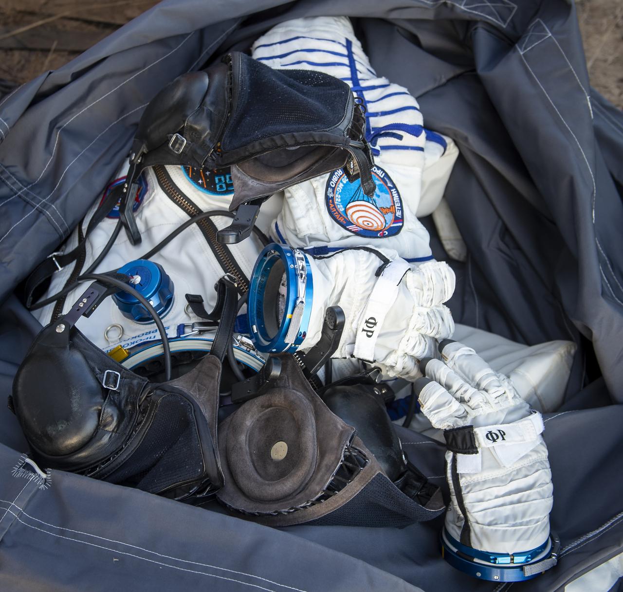 The Russian Sokol suit of Expedition 69 Roscosmos cosmonaut Sergey Prokopyev, is seen outside of the medical tent after he and crewmates NASA astronaut Frank Rubio, and Roscosmos cosmonaut Dmitri Petelin landed in their Soyuz MS-23 capsule, Wednesday, Sept. 27, 2023, just outside of Zhezkazgan, Kazakhstan. The trio are returned to Earth after logging 371 days in space as members of Expeditions 68-69 aboard the International Space Station. For Rubio, his mission is the longest single spaceflight by a U.S. astronaut in history. Photo Credit: (NASA/GCTC/Pavel Shvets)