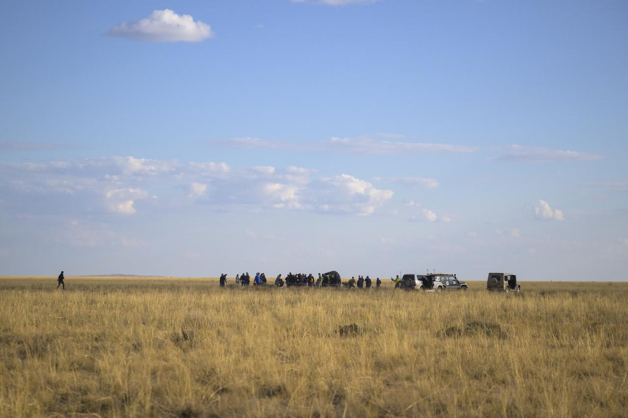 Russian Search and Rescue teams arrive at the Soyuz MS-23 spacecraft shortly after it landed in a remote area near the town of Zhezkazgan, Kazakhstan with Expedition 69 NASA astronaut Frank Rubio, Roscosmos cosmonauts Dmitri Petelin and Sergey Prokopyev, Wednesday, Sept. 27, 2023. The trio are returning to Earth after logging 371 days in space as members of Expeditions 68-69 aboard the International Space Station. For Rubio, his mission is the longest single spaceflight by a U.S. astronaut in history. Photo Credit: (NASA/Bill Ingalls)