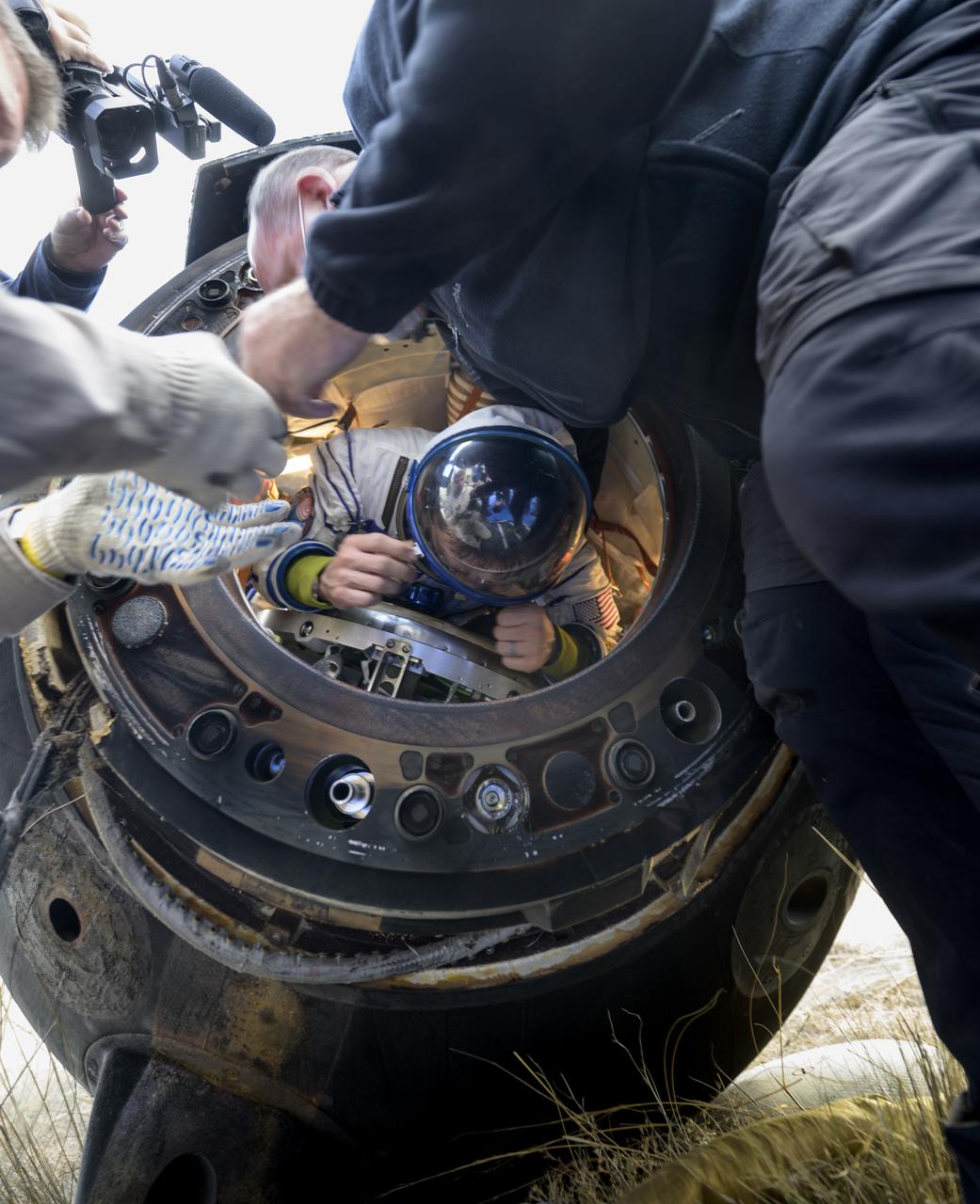 Expedition 69 NASA astronaut Frank Rubio is helped out of the Soyuz MS-23 spacecraft just minutes after he and Roscosmos cosmonauts Dmitri Petelin and Sergey Prokopyev, landed in a remote area near the town of Zhezkazgan, Kazakhstan on Wednesday, Sept. 27, 2023. The trio are returning to Earth after logging 371 days in space as members of Expeditions 68-69 aboard the International Space Station. For Rubio, his mission is the longest single spaceflight by a U.S. astronaut in history. Photo Credit: (NASA/Bill Ingalls)