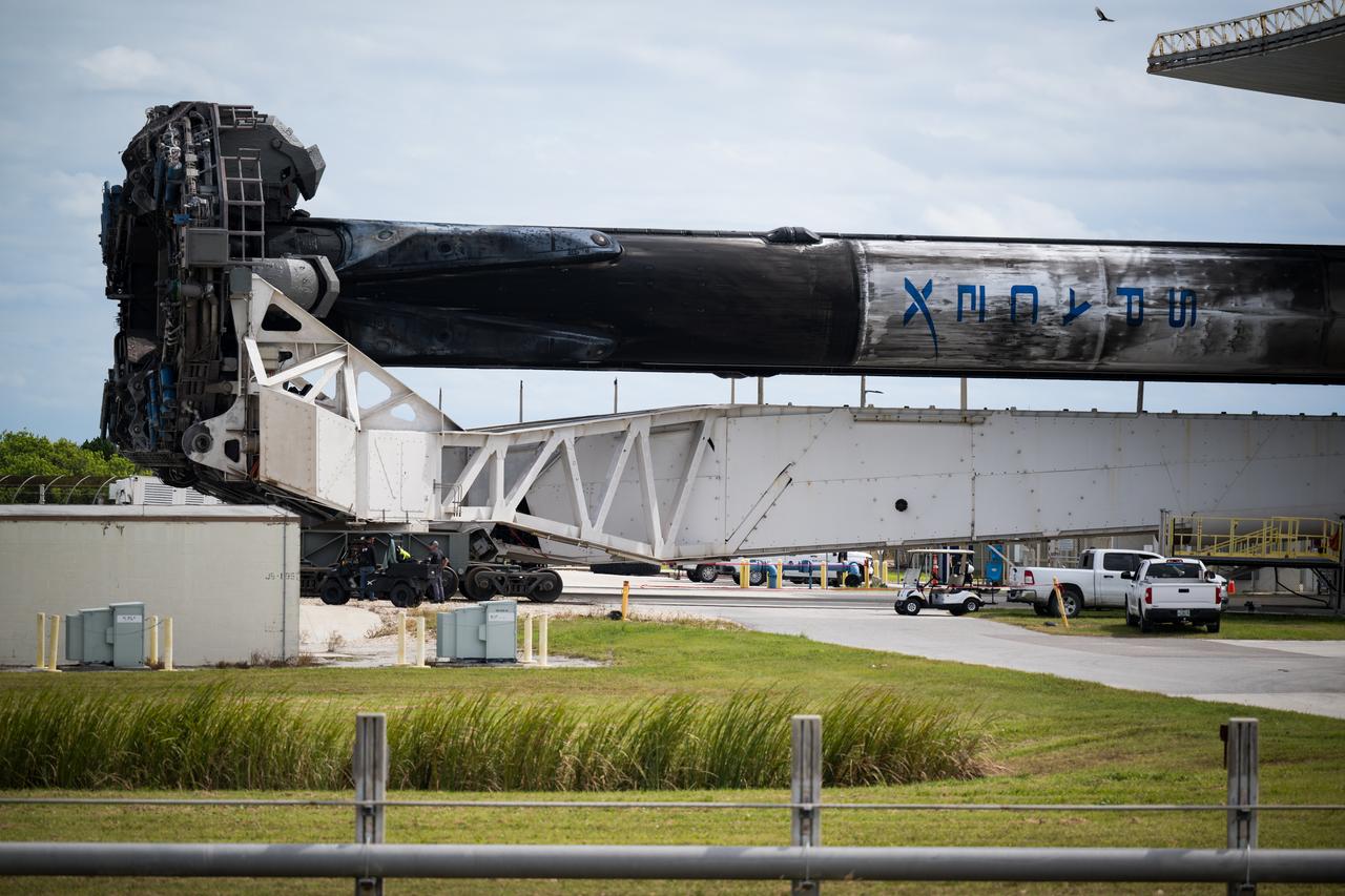 A SpaceX Falcon Heavy rocket with the Psyche spacecraft onboard is seen as it is rolled out of the horizontal integration facility at Launch Complex 39A as preparations continue for the Psyche mission, Tuesday, Oct. 10, 2023, at NASA’s Kennedy Space Center in Florida. NASA’s Psyche spacecraft will travel to a metal-rich asteroid by the same name orbiting the Sun between Mars and Jupiter to study it’s composition. The spacecraft also carries the agency's Deep Space Optical Communications technology demonstration, which will test laser communications beyond the Moon. Photo Credit: (NASA/Aubrey Gemignani)