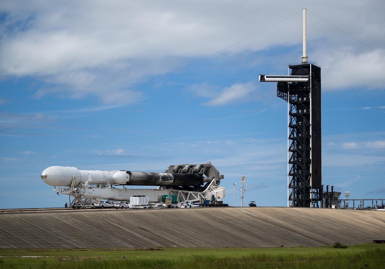 A SpaceX Falcon Heavy rocket with the Psyche spacecraft onboard is seen as it is rolled to the launch pad at Launch Complex 39A as preparations continue for the Psyche mission, Tuesday, Oct. 10, 2023, at NASA’s Kennedy Space Center in Florida. NASA’s Psyche spacecraft will travel to a metal-rich asteroid by the same name orbiting the Sun between Mars and Jupiter to study it’s composition. The spacecraft also carries the agency's Deep Space Optical Communications technology demonstration, which will test laser communications beyond the Moon. Photo Credit: (NASA/Aubrey Gemignani)