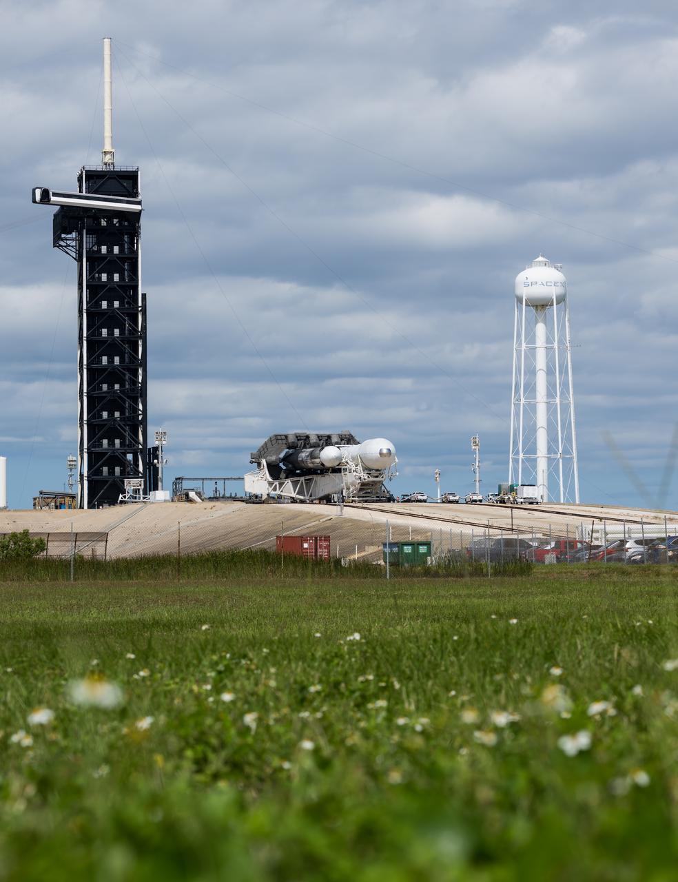 A SpaceX Falcon Heavy rocket with the Psyche spacecraft onboard is seen as it is rolled to the launch pad at Launch Complex 39A as preparations continue for the Psyche mission, Tuesday, Oct. 10, 2023, at NASA’s Kennedy Space Center in Florida. NASA’s Psyche spacecraft will travel to a metal-rich asteroid by the same name orbiting the Sun between Mars and Jupiter to study it’s composition. The spacecraft also carries the agency's Deep Space Optical Communications technology demonstration, which will test laser communications beyond the Moon. Photo Credit: (NASA/Aubrey Gemignani)