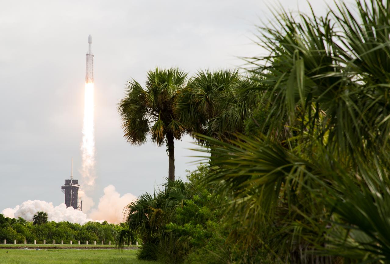 A SpaceX Falcon Heavy rocket with the Psyche spacecraft onboard is launched from Launch Complex 39A, Friday, Oct. 13, 2023, at NASA’s Kennedy Space Center in Florida. NASA’s Psyche spacecraft will travel to a metal-rich asteroid by the same name orbiting the Sun between Mars and Jupiter to study it’s composition. The spacecraft also carries the agency's Deep Space Optical Communications technology demonstration, which will test laser communications beyond the Moon. Photo Credit: (NASA/Aubrey Gemignani)