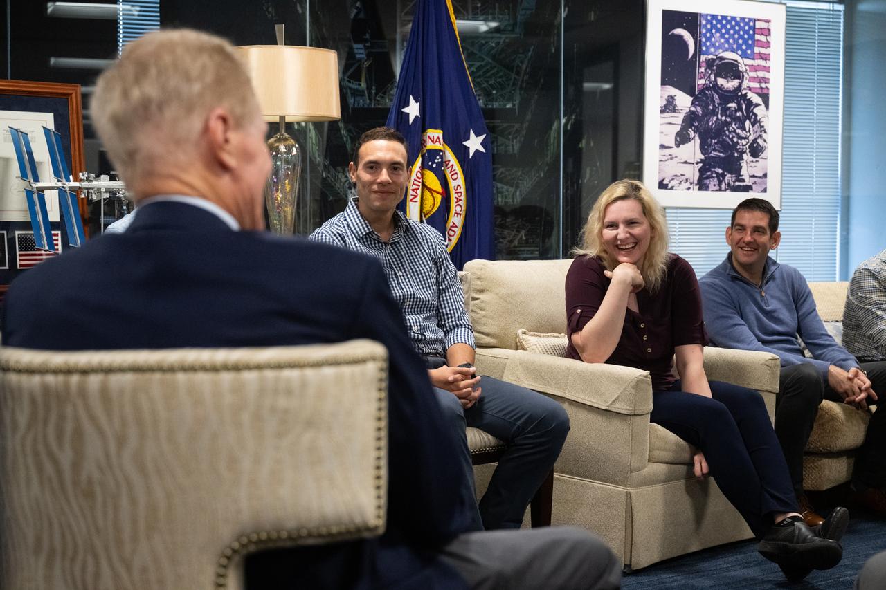 NASA astronaut candidates Marcos Berríos, left, Deniz Burnham, center, and Jack Hathaway, right, are seen during a meeting with NASA Administrator Bill Nelson, NASA Deputy Administrator Pam Melroy, and Bob Cabana, NASA associate administrator, Wednesday, Oct. 18, 2023, at the Mary W. Jackson NASA Headquarters building in Washington. Upon completion of two years of training they could be assigned to missions that involve performing research aboard the International Space Station, launching from American soil on spacecraft built by commercial companies, as well as deep space missions to destinations including the Moon on NASA’s Orion spacecraft and Space Launch System rocket. Photo Credit: (NASA/Joel Kowsky)