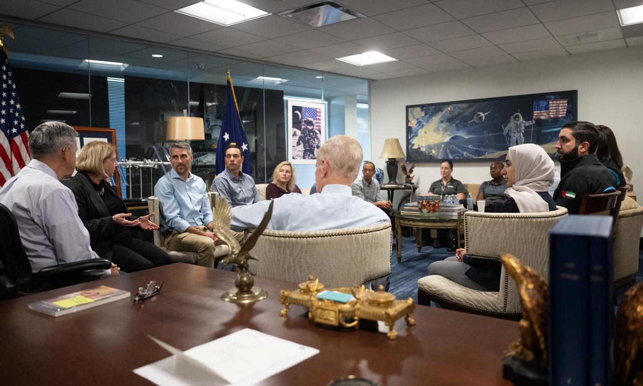 NASA Deputy Administrator Pam Melroy, second from left, Bob Cabana, NASA associate administrator, and NASA Administrator Bill Nelson, speak with the 2021 astronaut candidate class, Wednesday, Oct. 18, 2023, at the Mary W. Jackson NASA Headquarters building in Washington. Upon completion of two years of training they could be assigned to missions that involve performing research aboard the International Space Station, launching from American soil on spacecraft built by commercial companies, as well as deep space missions to destinations including the Moon on NASA’s Orion spacecraft and Space Launch System rocket. Photo Credit: (NASA/Joel Kowsky)
