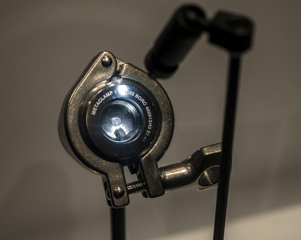 The first public display of a sample from asteroid Bennu is seen, Friday, Nov. 3, 2023, at the Smithsonian’s National Museum of Natural History in Washington. The sample was collected from the carbon rich near Earth asteroid Bennu in October 2020 by NASA’s OSIRIS-REx spacecraft. Photo Credit: (NASA/Keegan Barber)