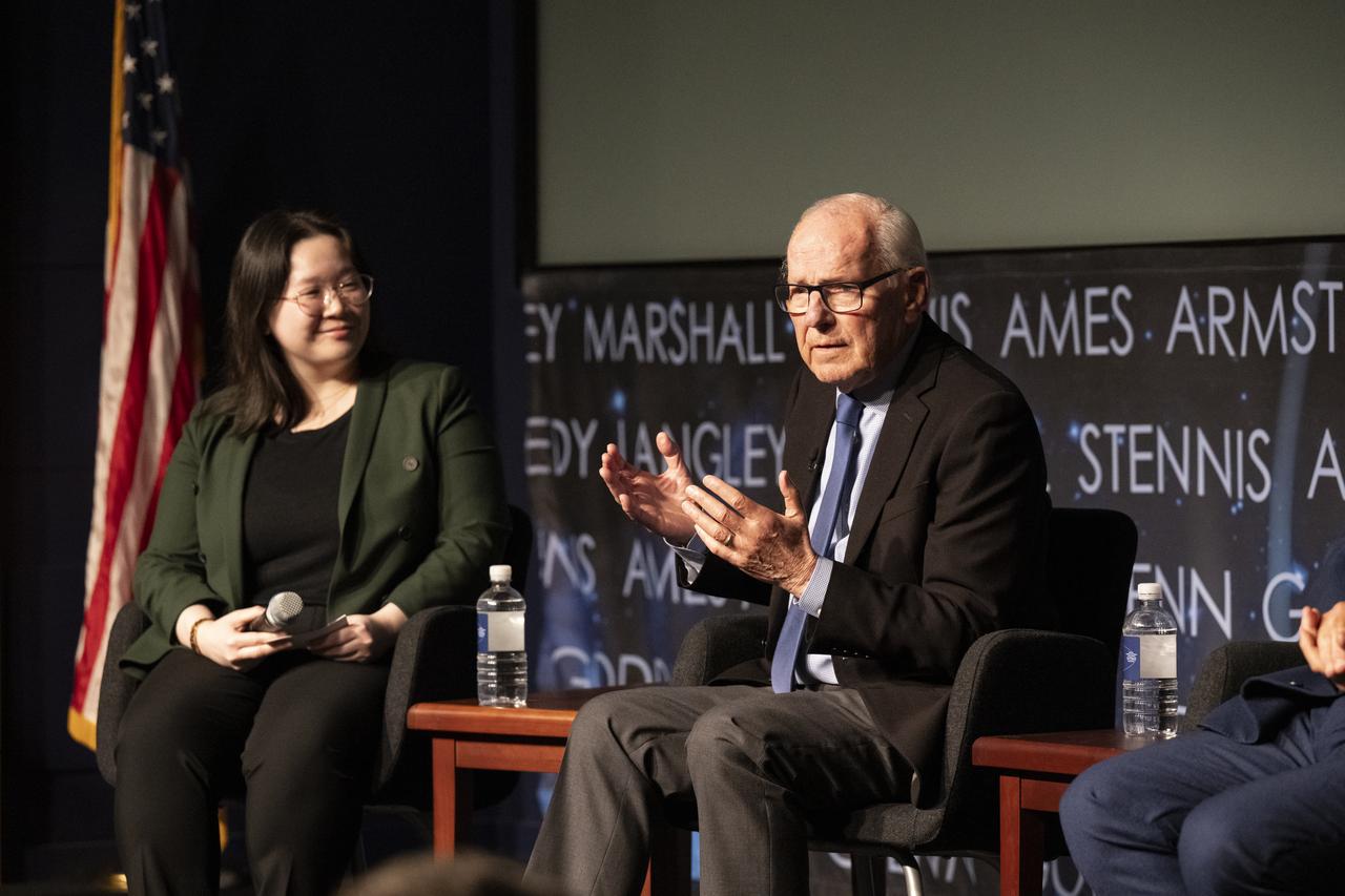 Richard Danne, creator of the NASA worm logotype, right, answers questions during a dedication event, Monday, Nov. 6, 2023, at the Mary W. Jackson NASA Headquarters building in Washington. Photo Credit: (NASA/Keegan Barber)