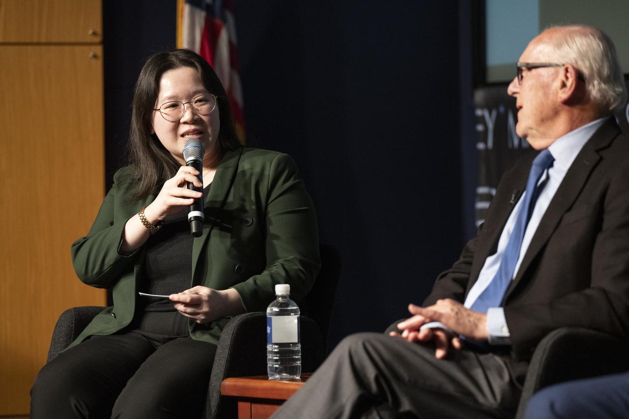 Moderator and Washington Post design reporter Shelly Tan, left, and creator of the NASA worm logotype Richard Danne, right, participate in a panel discussion during a Richard Danne dedication event, Monday, Nov. 6, 2023, at the Mary W. Jackson NASA Headquarters building in Washington. Photo Credit: (NASA/Keegan Barber)