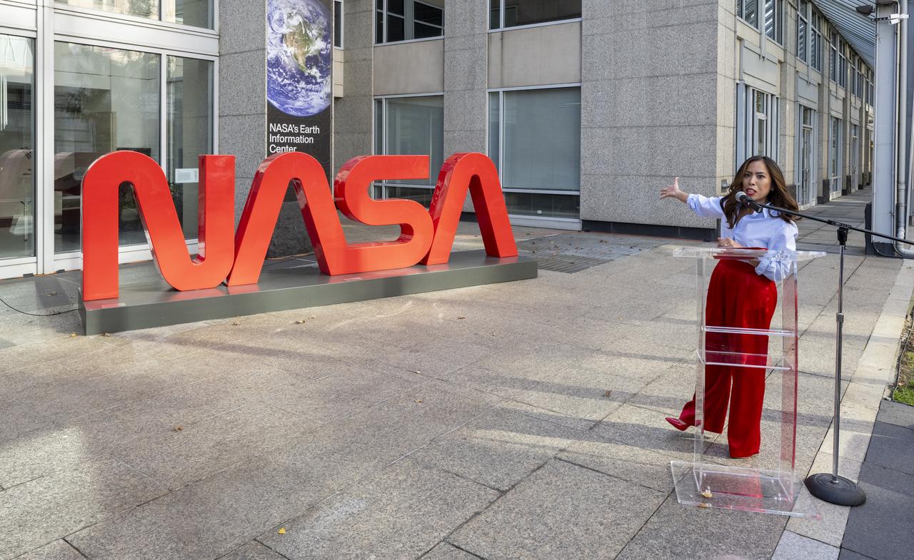 NASA Public Affairs Specialist Megan Cruz delivers remarks during a dedication event for Richard Danne, creator of the NASA worm logotype, Monday, Nov. 6, 2023, at the Mary W. Jackson NASA Headquarters building in Washington. Photo Credit: (NASA/Keegan Barber)