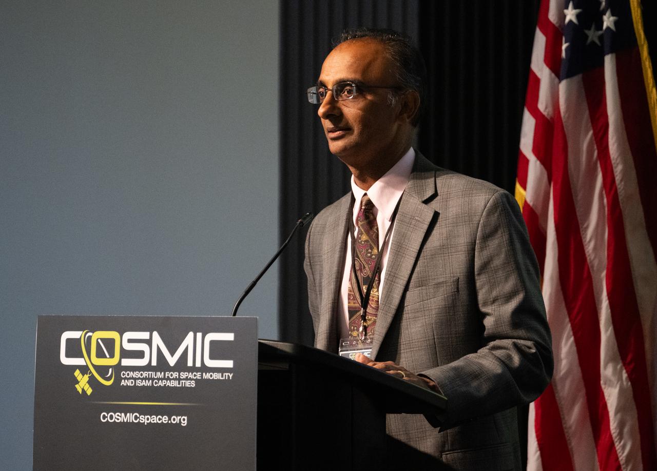 Prasun Desai, acting associate administrator for NASA's Space Technology Mission Directorate, delivers opening remarks at the Consortium for Space Mobility and ISAM Capabilities (COSMIC) workshop, Tuesday, Nov. 7, 2023, at the University of Maryland in College Park, Md. NASA’s Space Technology Mission Directorate formulated and funds COSMIC, aiming to create a nationwide aerospace community alliance that provides global leadership in space mobility and in-space servicing, assembly, and manufacturing (ISAM) for use in Earth orbit, lunar orbit, deep space, and on planetary surfaces. Photo Credit: (NASA/Joel Kowsky)