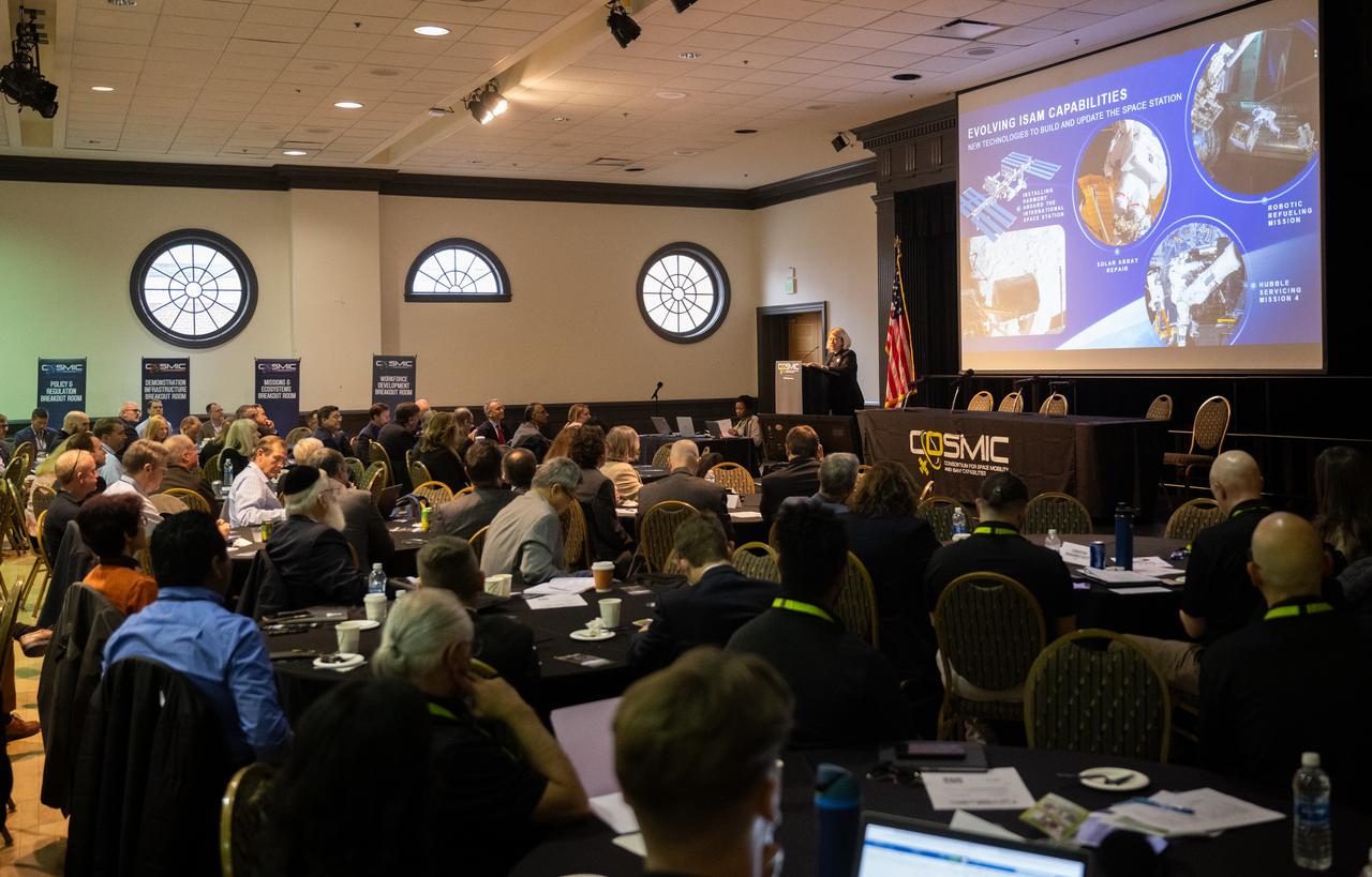 NASA Deputy Administrator Pam Melroy delivers keynote remarks at the Consortium for Space Mobility and ISAM Capabilities (COSMIC) workshop, Tuesday, Nov. 7, 2023, at the University of Maryland in College Park, Md. NASA’s Space Technology Mission Directorate formulated and funds COSMIC, aiming to create a nationwide aerospace community alliance that provides global leadership in space mobility and in-space servicing, assembly, and manufacturing (ISAM) for use in Earth orbit, lunar orbit, deep space, and on planetary surfaces. Photo Credit: (NASA/Joel Kowsky)