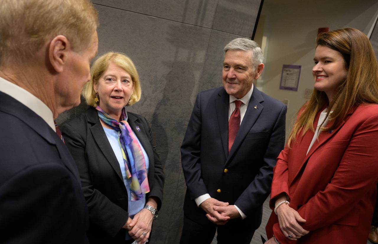 NASA Administrator Bill Nelson, left, NASA Deputy Administrator Pam Melroy, NASA Associate Administrator Bob Cabana, and NASA Deputy Associate Administrator Casey Swails, right, talk prior to a NASA town hall event, Tuesday, Dec. 12, 2023, at the NASA Headquarters Mary W. Jackson Building in Washington. Photo Credit: (NASA/Bill Ingalls)