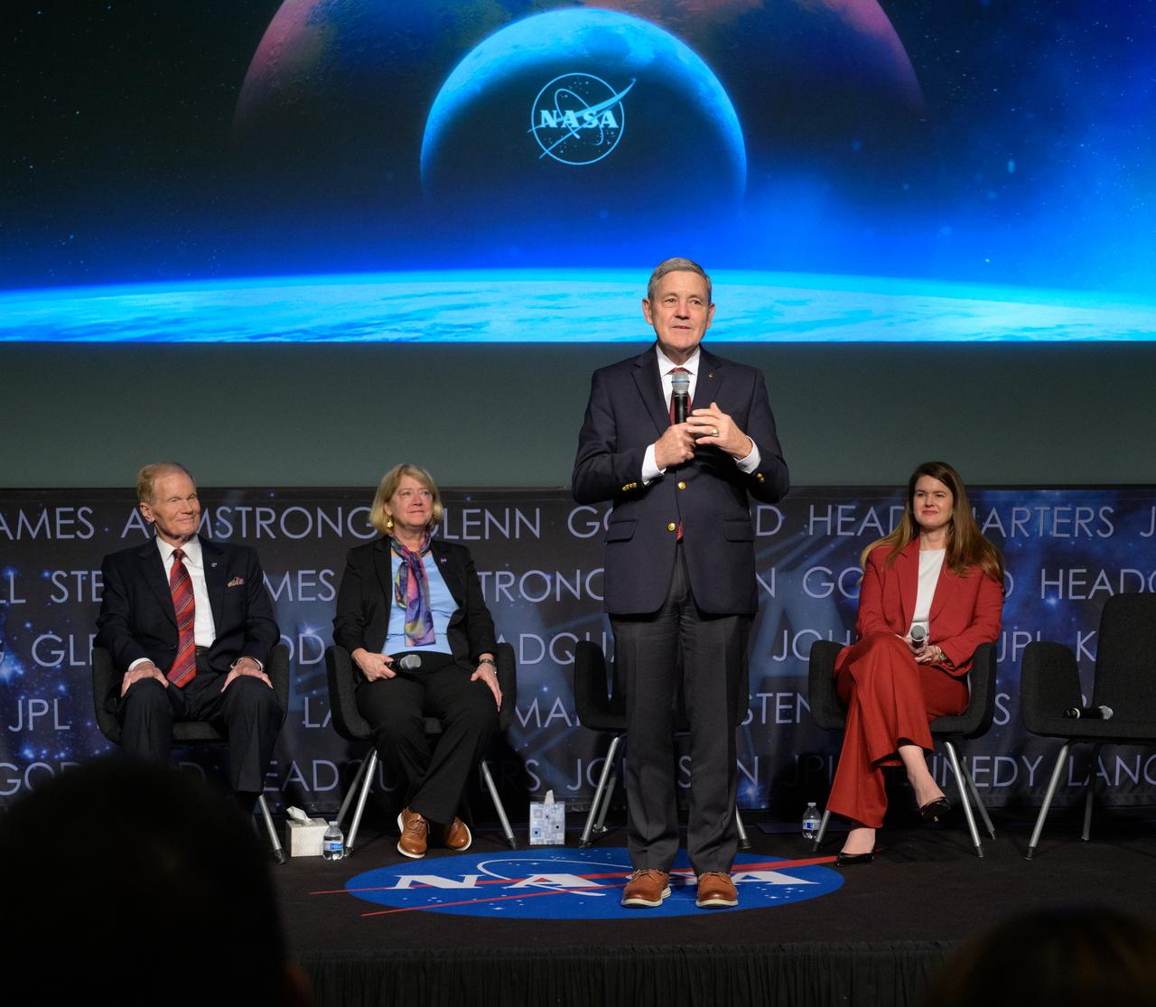 NASA Associate Administrator Bob Cabana gives remarks during a NASA town hall event as NASA Administrator Bill Nelson, left, NASA Deputy Administrator Pam Melroy, and NASA Deputy Associate Administrator Casey Swails, right, look on, Tuesday, Dec. 12, 2023, at the NASA Headquarters Mary W. Jackson Building in Washington. Photo Credit: (NASA/Bill Ingalls)