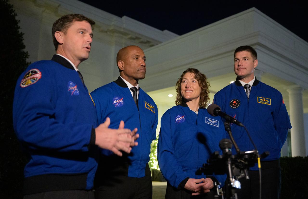 Artemis II crew members: NASA astronauts Reid Wiseman, left, Victor Glover, and Christina Koch, and CSA (Canadian Space Agency) astronaut Jeremy Hansen, right, speak to reporters after their meetings with U.S. President Joe Biden and U.S. Vice President Kamala Harris at the White House in Washington, Thursday, Dec. 14, 2023. During their mission, the Artemis II crew will travel aboard NASA's Orion spacecraft on a 10-day mission around the Moon, testing spacecraft systems for the first time with astronauts for long-term exploration and scientific discovery. Photo Credit: (NASA/Bill Ingalls)