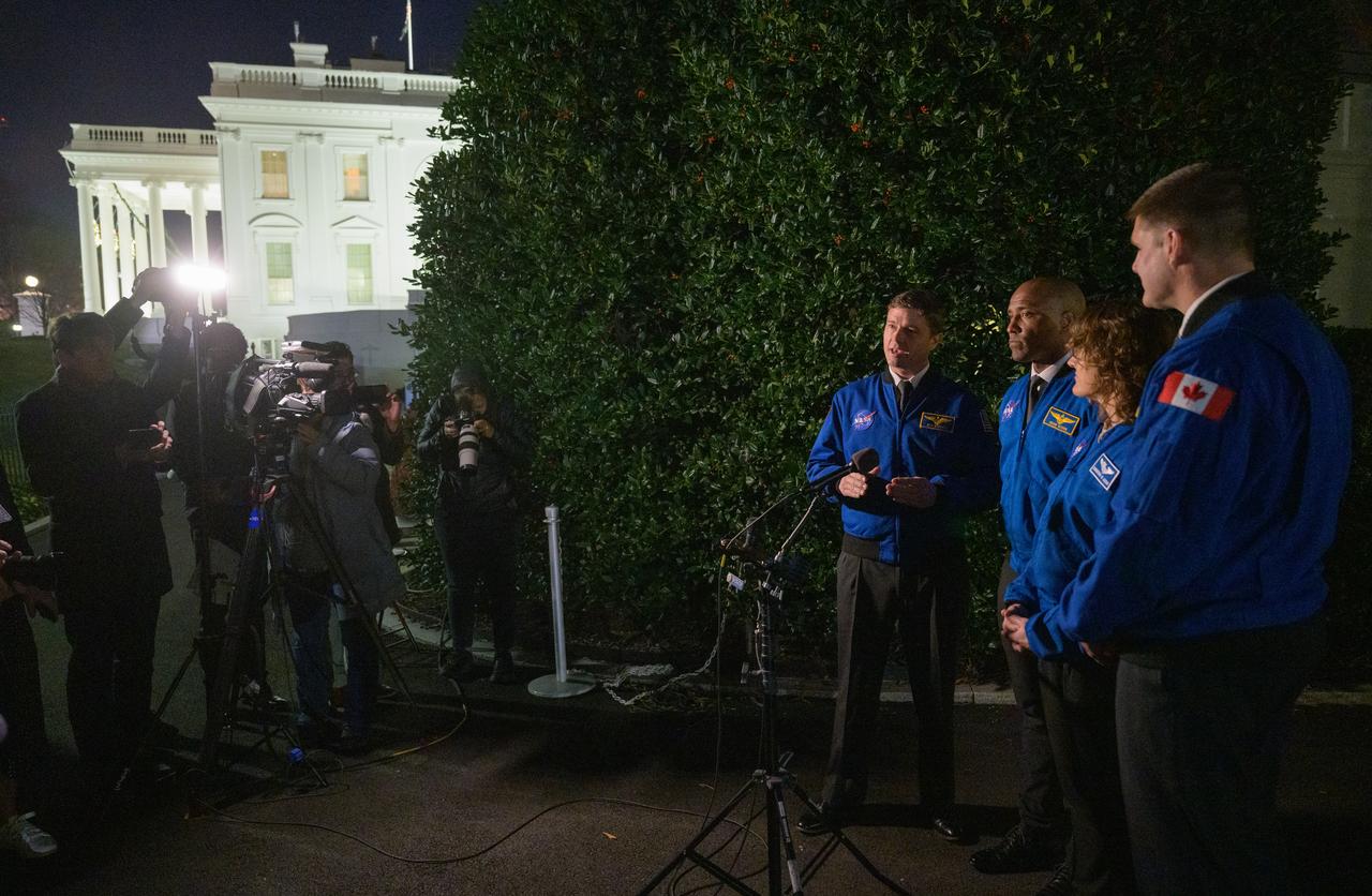 Artemis II crew members: NASA astronauts Reid Wiseman, left, Victor Glover, and Christina Koch, and CSA (Canadian Space Agency) astronaut Jeremy Hansen, right, speak to reporters after their meetings with U.S. President Joe Biden and U.S. Vice President Kamala Harris at the White House in Washington, Thursday, Dec. 14, 2023. During their mission, the Artemis II crew will travel aboard NASA's Orion spacecraft on a 10-day mission around the Moon, testing spacecraft systems for the first time with astronauts for long-term exploration and scientific discovery. Photo Credit: (NASA/Bill Ingalls)