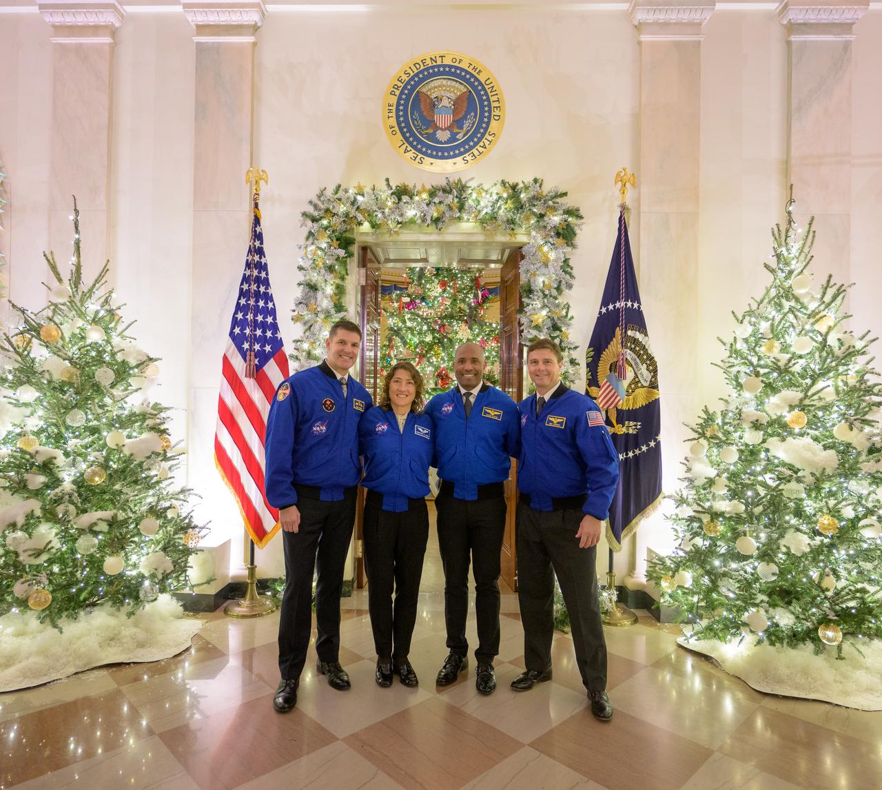 Artemis II crew members: CSA (Canadian Space Agency) astronaut Jeremy Hansen, left, NASA astronauts Christina Koch, Victor Glover, and Reid Wiseman, right, pose for a group photograph after their meetings with U.S. President Joe Biden and U.S. Vice President Kamala Harris at the White House in Washington, Thursday, Dec. 14, 2023. During their mission, the Artemis II crew will travel aboard NASA's Orion spacecraft on a 10-day mission around the Moon, testing spacecraft systems for the first time with astronauts for long-term exploration and scientific discovery. Photo Credit: (NASA/Bill Ingalls)