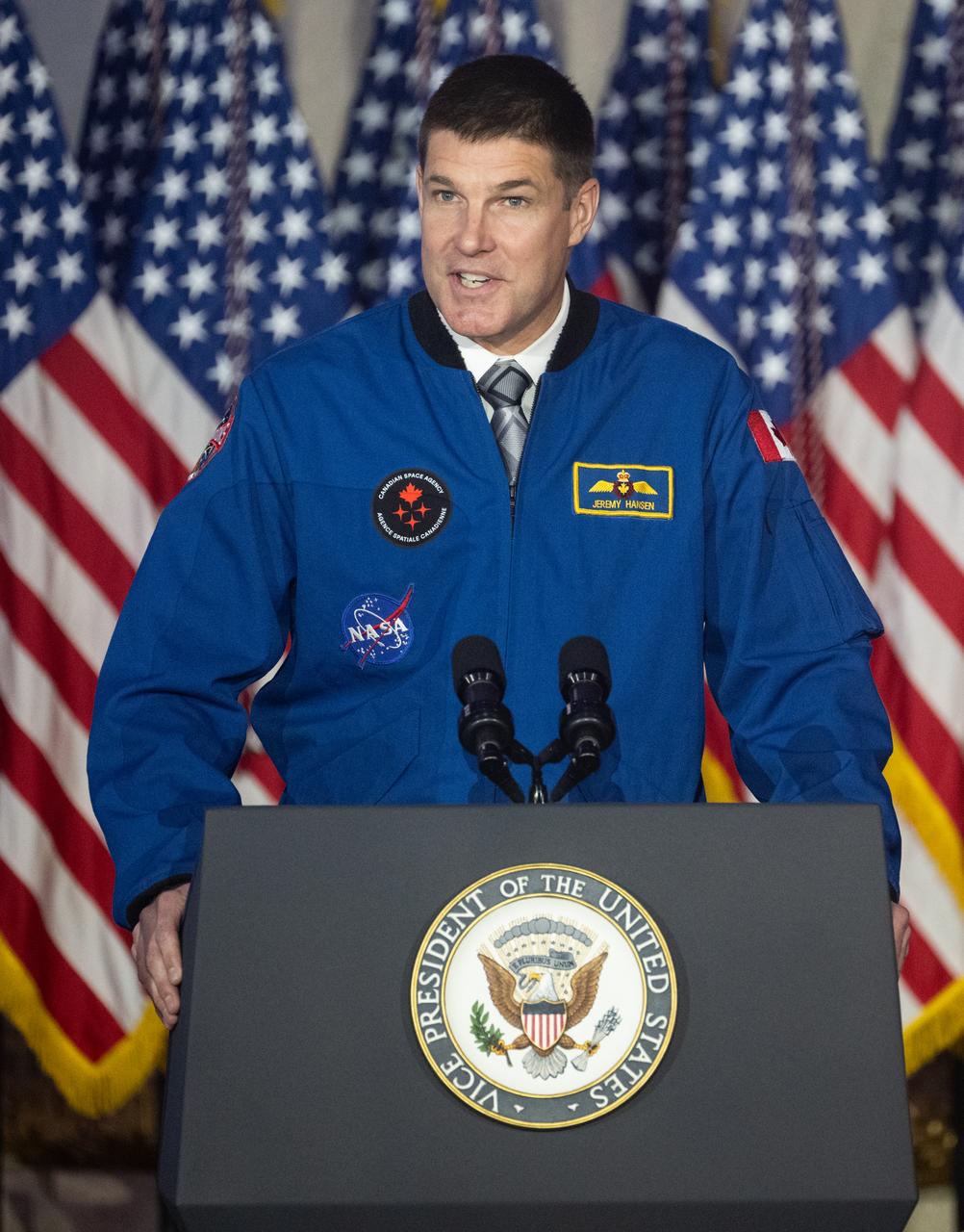 CSA (Canadian Space Agency) astronaut and Artemis II crew member Jeremy Hansen introduces Vice President Kamala Harris during the third meeting of the National Space Council, Wednesday, Dec. 20, 2023, at the Andrew W. Mellon Auditorium in Washington. Chaired by Vice President Kamala Harris, the council's role is to advise the President regarding national space policy and strategy, and ensuring the United States capitalizes on the opportunities presented by the country’s space activities.  Photo Credit: (NASA/Joel Kowsky)