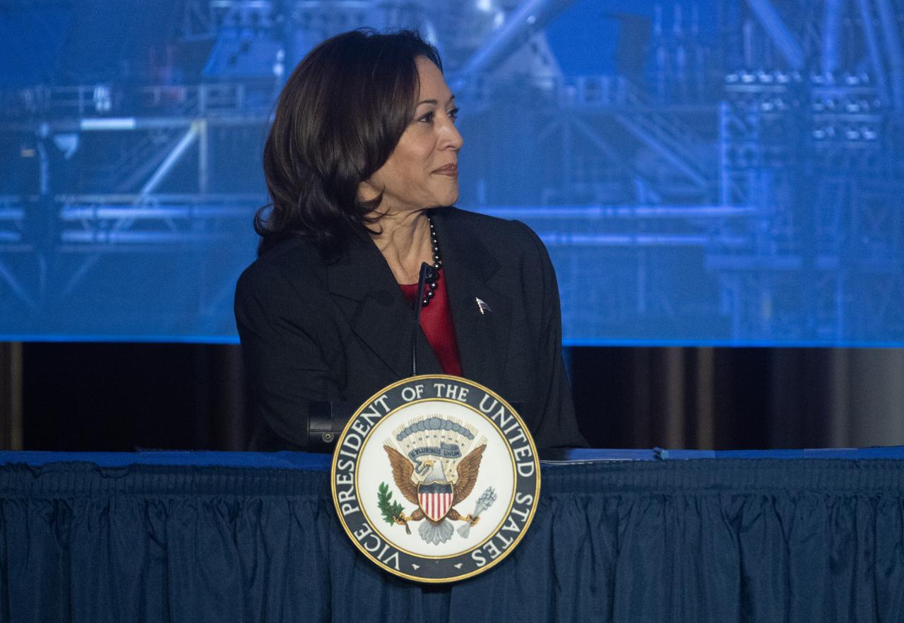 Vice President Kamala Harris listens as CSA (Canadian Space Agency) astronaut and Artemis II crew member Jeremy Hansen introduces her at the third meeting of the National Space Council, Wednesday, Dec. 20, 2023, at the Andrew W. Mellon Auditorium in Washington. Chaired by Vice President Kamala Harris, the council's role is to advise the President regarding national space policy and strategy, and ensuring the United States capitalizes on the opportunities presented by the country’s space activities.  Photo Credit: (NASA/Joel Kowsky)