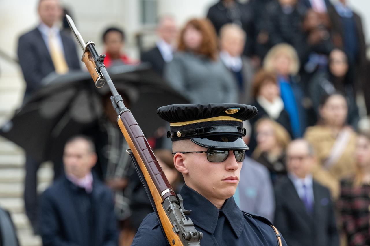 A member of The Old Guard, 3rd U.S. Infantry Regiment is seen during a wreath laying ceremony as part of NASA's Day of Remembrance, Thursday, Jan. 25, 2024, at Arlington National Cemetery in Arlington, Va. The wreaths were laid in memory of those men and women who lost their lives in the quest for space exploration. Photo Credit: (NASA/Keegan Barber)