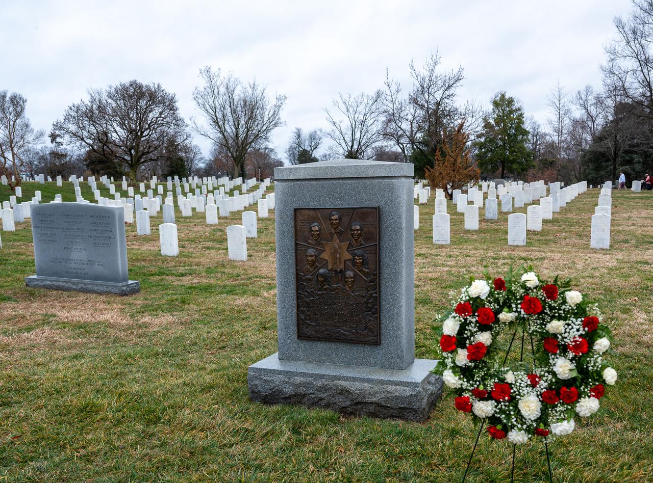 A wreath is seen by the Space Shuttle Challenger Memorial during a wreath laying ceremony that was part of NASA's Day of Remembrance, Thursday, Jan. 25, 2024, at Arlington National Cemetery in Arlington, Va. The wreaths were laid in memory of those men and women who lost their lives in the quest for space exploration. Photo Credit: (NASA/Keegan Barber)