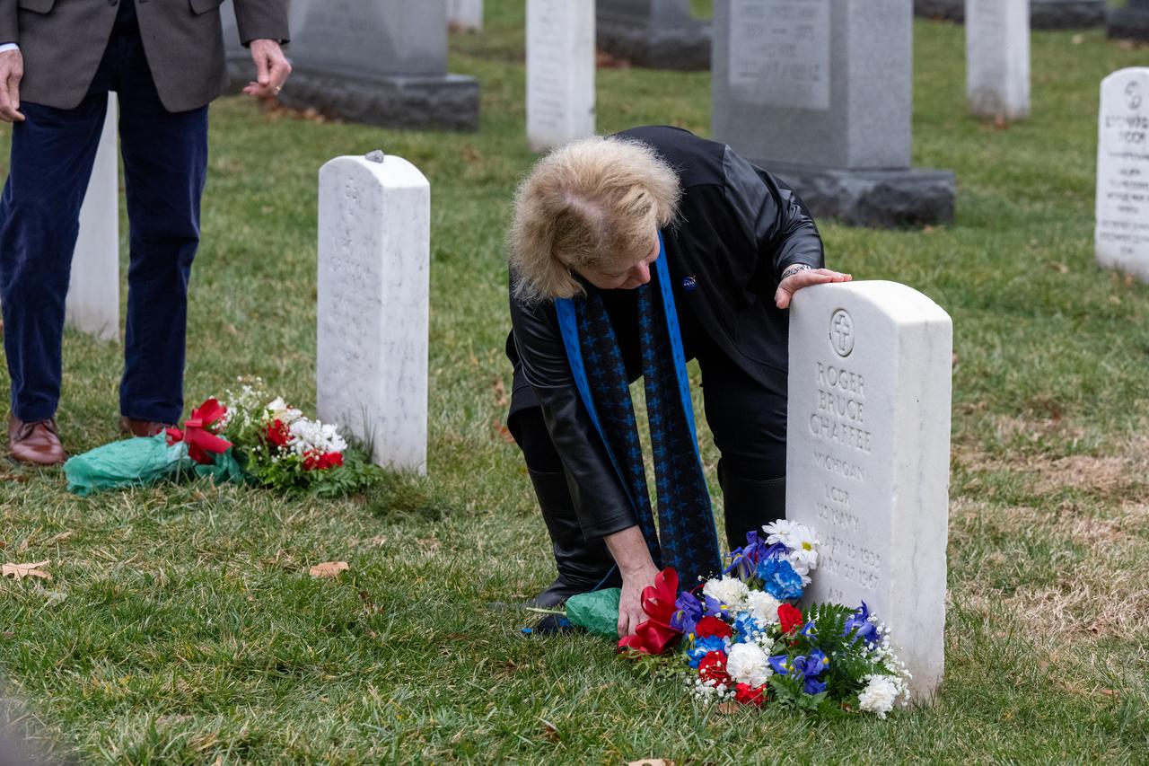 NASA Administrator Bill Nelson and NASA Deputy Administrator Pam Melroy place flowers at the grave markers of Virgil "Gus" Grissom and Roger Chaffee from Apollo 1, during a ceremony that was part of NASA's Day of Remembrance, Thursday, Jan. 25, 2024, at Arlington National Cemetery in Arlington, Va. The wreaths were laid in memory of those men and women who lost their lives in the quest for space exploration. Photo Credit: (NASA/Keegan Barber)