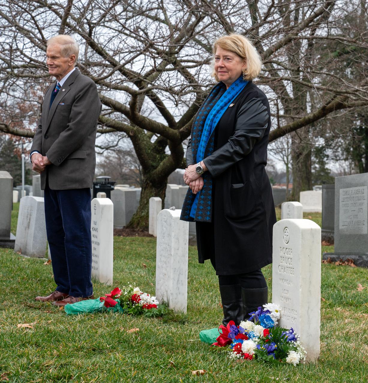 NASA Administrator Bill Nelson and NASA Deputy Administrator Pam Melroy place flowers at the grave markers of Virgil "Gus" Grissom and Roger Chaffee from Apollo 1, during a ceremony that was part of NASA's Day of Remembrance, Thursday, Jan. 25, 2024, at Arlington National Cemetery in Arlington, Va. The wreaths were laid in memory of those men and women who lost their lives in the quest for space exploration. Photo Credit: (NASA/Keegan Barber)