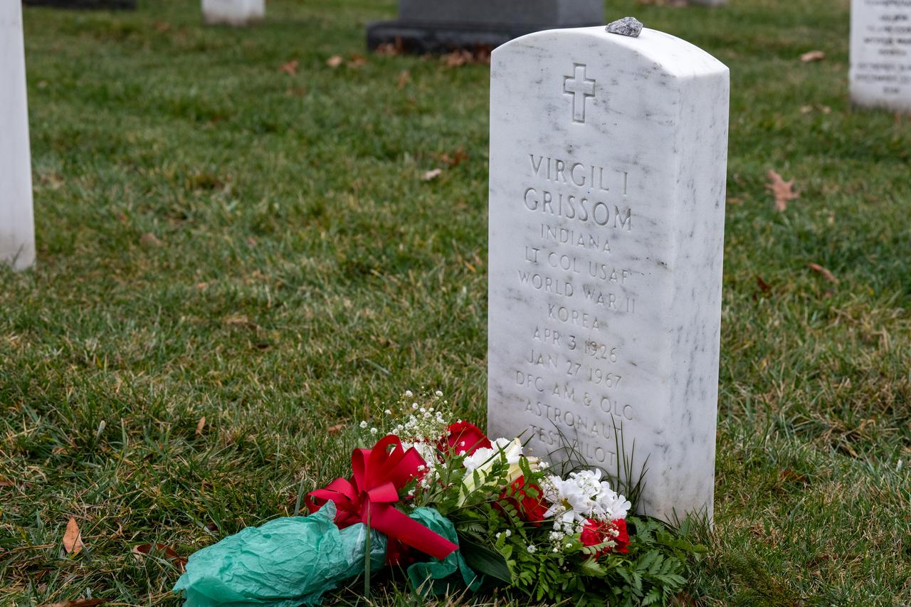 Flowers are seen at the grave marker of Virgil "Gus" Grissom from Apollo 1 after NASA Administrator Bill Nelson and Deputy Administrator Pam Melroy placed them there during a ceremony that was part of NASA's Day of Remembrance, Thursday, Jan. 25, 2024, at Arlington National Cemetery in Arlington, Va. The wreaths were laid in memory of those men and women who lost their lives in the quest for space exploration. Photo Credit: (NASA/Keegan Barber)