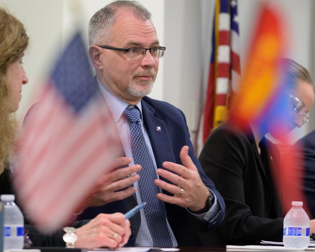 Associate Administrator Jim Free, talks with Mongolian Minister of Digital Development and Communications Nyam-Osor Uchral during a meeting to discuss Mongolia’s National Space Strategy planning and methods for natural disasters monitoring and prevention, Friday, Jan. 26, 2024, at the NASA Headquarters Mary W. Jackson Building in Washington. Photo Credit: (NASA/Bill Ingalls)