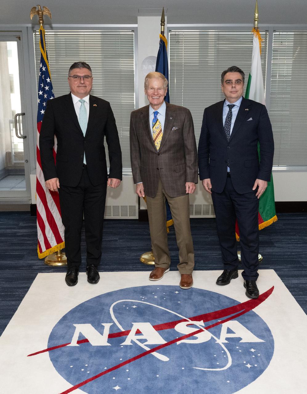 Bulgarian Ambassador to the United States Georgi Panayotov, left, NASA Administrator Bill Nelson, center, and Bulgarian Minister of Finance Assen Vassilev, right, pose for a picture prior to a meeting at the Mary W. Jackson NASA Headquarters building, Wednesday, Feb. 7, 2024, in Washington. Photo Credit: (NASA/Joel Kowsky)
