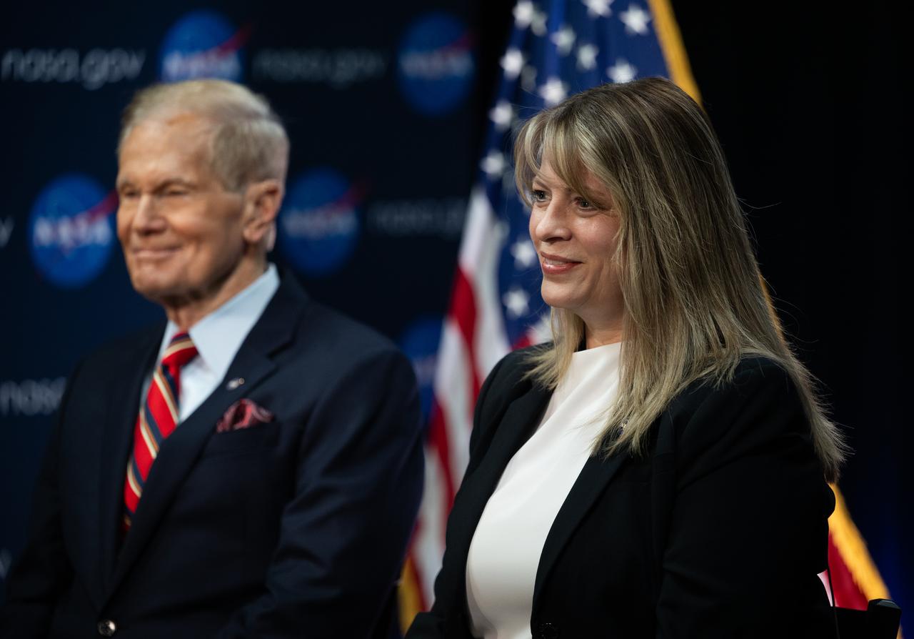 Lisa Carnell, director of NASA’s Biological and Physical Sciences Division, right, speaks along side NASA Administrator Bill Nelson during an Earth-to-space call with astronauts aboard the International Space Station, Wednesday, Feb. 21, 2024, at the Mary W. Jackson NASA Headquarters building in Washington. Nelson and Carnell spoke with Expedition 70 crew members Andreas Mogenson of ESA, Jasmin Moghbeli of NASA, and Satoshi Furukawa of JAXA about recent science research and technology demonstrations aboard the orbiting laboratory. Photo Credit: (NASA/Joel Kowsky)