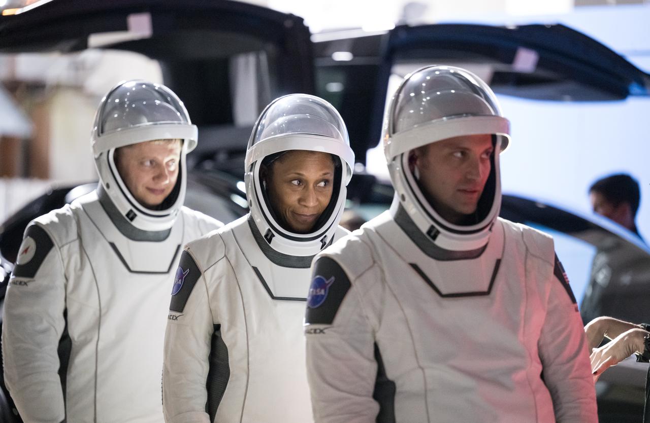 Roscosmos cosmonaut Alexander Grebenkin, and NASA astronauts Jeanette Epps, and Matthew Dominick, wearing SpaceX spacesuits, are seen as they prepare to depart the Neil A. Armstrong Operations and Checkout Building for Launch Complex 39A during a dress rehearsal prior to the Crew-8 mission launch, Monday, Feb. 26, 2024, at NASA’s Kennedy Space Center in Florida. NASA’s SpaceX Crew-8 mission is the eighth crew rotation mission of the SpaceX Dragon spacecraft and Falcon 9 rocket to the International Space Station as part of the agency’s Commercial Crew Program. Dominick, Barratt, Epps, and Grebenkin are scheduled to launch at 12:04 a.m. EST on Friday, March 1, from Launch Complex 39A at the Kennedy Space Center. Photo Credit: (NASA/Aubrey Gemignani)