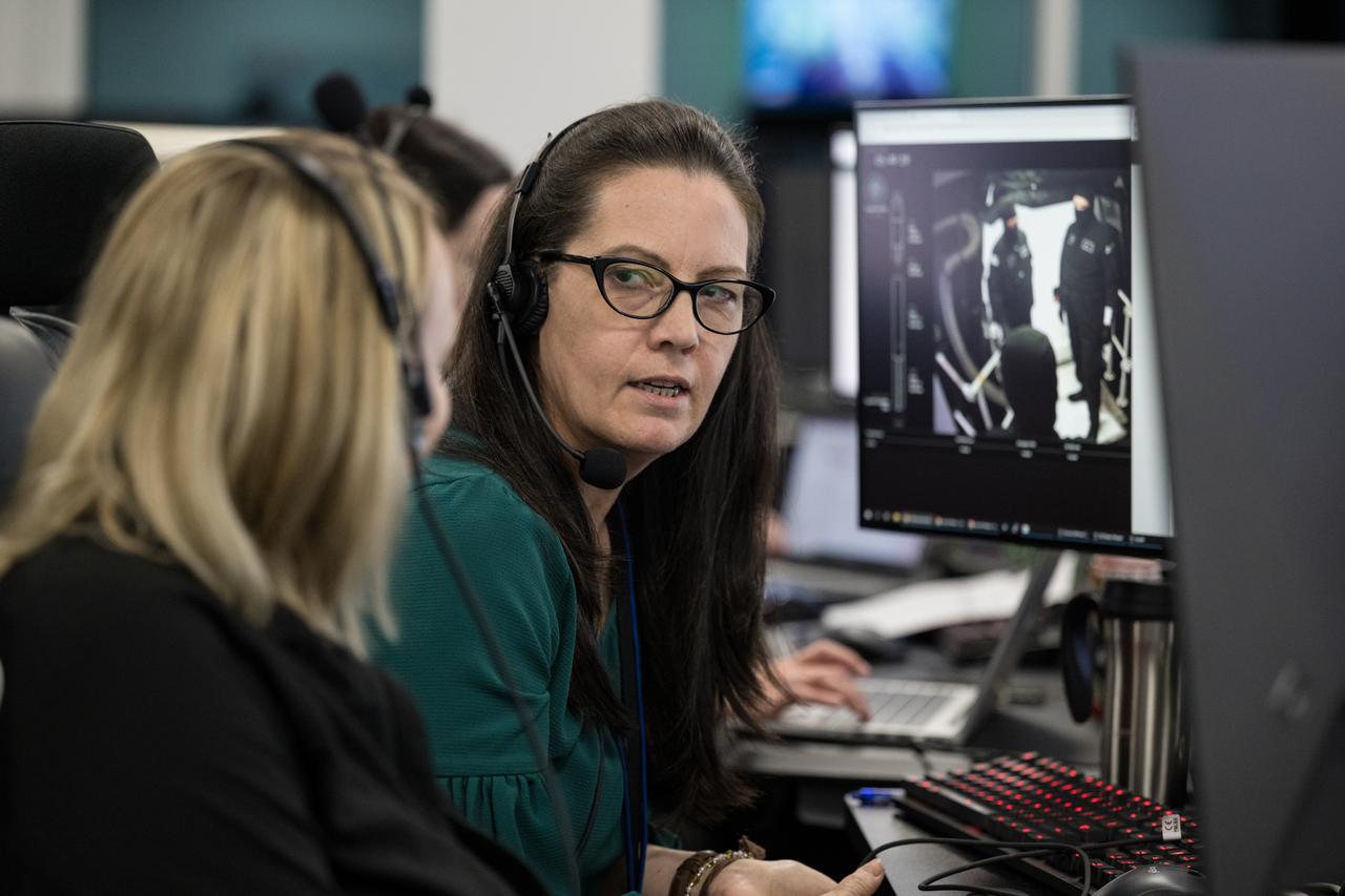 Katie Maynard, technical assistant to the Chief Flight Director, left, and Emily Nelson, NASA's chief flight director, second from left, monitor the countdown during a dress rehearsal in preparation for the launch of a SpaceX Falcon 9 rocket carrying the company's Dragon spacecraft on NASA’s SpaceX Crew-8 mission with NASA astronauts Matthew Dominick, Michael Barratt, and Jeanette Epps, and Roscosmos cosmonaut Alexander Grebenkin onboard, Monday, Feb. 26, 2024, in the control room of SpaceX’s HangerX at NASA’s Kennedy Space Center in Florida. NASA’s SpaceX Crew-8 mission is the eighth crew rotation mission of the SpaceX Dragon spacecraft and Falcon 9 rocket to the International Space Station as part of the agency’s Commercial Crew Program. Dominick, Barratt, Epps, and Grebenkin are scheduled to launch at 12:04 a.m. EST on Friday, March 1, from Launch Complex 39A at the Kennedy Space Center. Photo Credit: (NASA/Aubrey Gemignani)