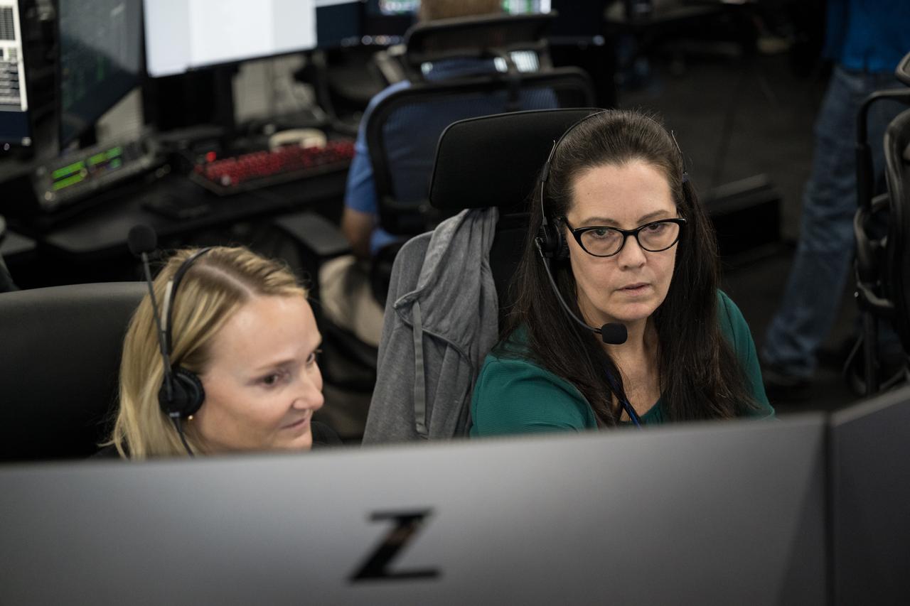 Katie Maynard, technical assistant to the Chief Flight Director, left, and Emily Nelson, NASA's chief flight director, second from left, monitor the countdown during a dress rehearsal in preparation for the launch of a SpaceX Falcon 9 rocket carrying the company's Dragon spacecraft on NASA’s SpaceX Crew-8 mission with NASA astronauts Matthew Dominick, Michael Barratt, and Jeanette Epps, and Roscosmos cosmonaut Alexander Grebenkin onboard, Monday, Feb. 26, 2024, in the control room of SpaceX’s HangerX at NASA’s Kennedy Space Center in Florida. NASA’s SpaceX Crew-8 mission is the eighth crew rotation mission of the SpaceX Dragon spacecraft and Falcon 9 rocket to the International Space Station as part of the agency’s Commercial Crew Program. Dominick, Barratt, Epps, and Grebenkin are scheduled to launch at 12:04 a.m. EST on Friday, March 1, from Launch Complex 39A at the Kennedy Space Center. Photo Credit: (NASA/Aubrey Gemignani)