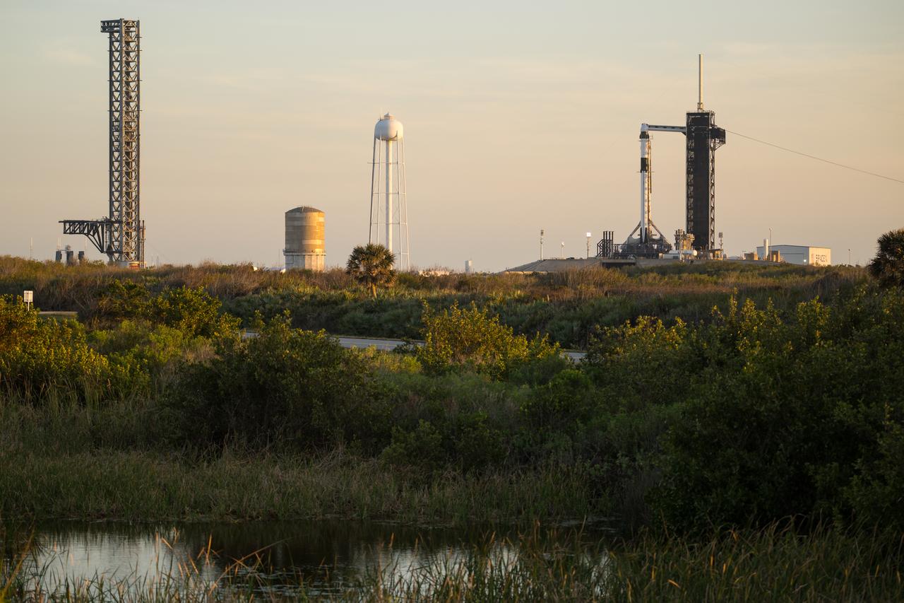 A SpaceX Falcon 9 rocket with the company's Dragon spacecraft on top is seen during sunset on the launch pad at Launch Complex 39A as preparations continue for the Crew-8 mission, Tuesday, Feb. 27, 2024, at NASA’s Kennedy Space Center in Florida. NASA’s SpaceX Crew-8 mission is the eighth crew rotation mission of the SpaceX Crew Dragon spacecraft and Falcon 9 rocket to the International Space Station as part of the agency’s Commercial Crew Program. NASA astronauts Matthew Dominick, Michael Barratt, Jeanette Epps, and Roscosmos cosmonaut Alexander Grebenkin are scheduled to launch at 12:04 a.m. EST on Friday, March 1, from Launch Complex 39A at the Kennedy Space Center. Photo Credit: (NASA/Aubrey Gemignani)