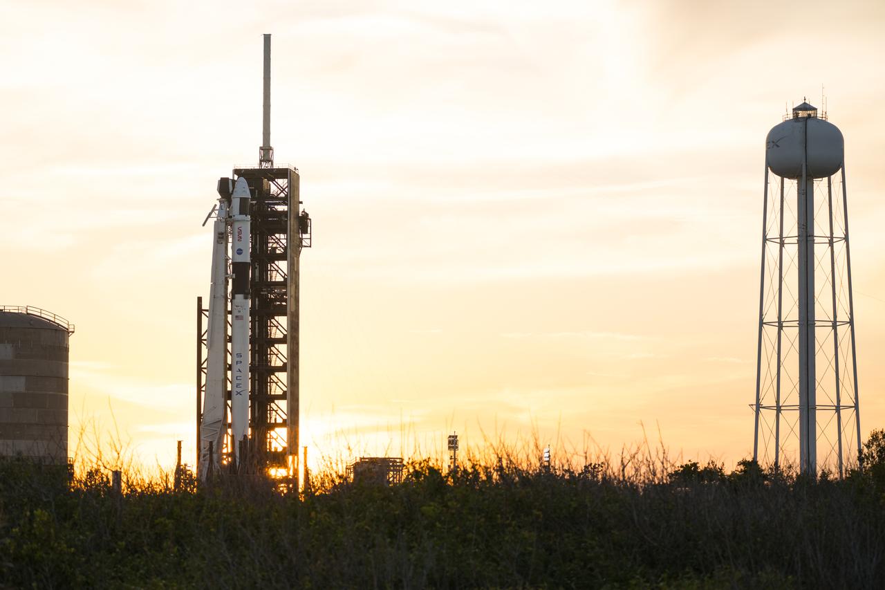 A SpaceX Falcon 9 rocket with the company's Dragon spacecraft on top is seen during sunset on the launch pad at Launch Complex 39A as preparations continue for the Crew-8 mission, Tuesday, Feb. 27, 2024, at NASA’s Kennedy Space Center in Florida. NASA’s SpaceX Crew-8 mission is the eighth crew rotation mission of the SpaceX Crew Dragon spacecraft and Falcon 9 rocket to the International Space Station as part of the agency’s Commercial Crew Program. NASA astronauts Matthew Dominick, Michael Barratt, Jeanette Epps, and Roscosmos cosmonaut Alexander Grebenkin are scheduled to launch at 12:04 a.m. EST on Friday, March 1, from Launch Complex 39A at the Kennedy Space Center. Photo Credit: (NASA/Aubrey Gemignani)