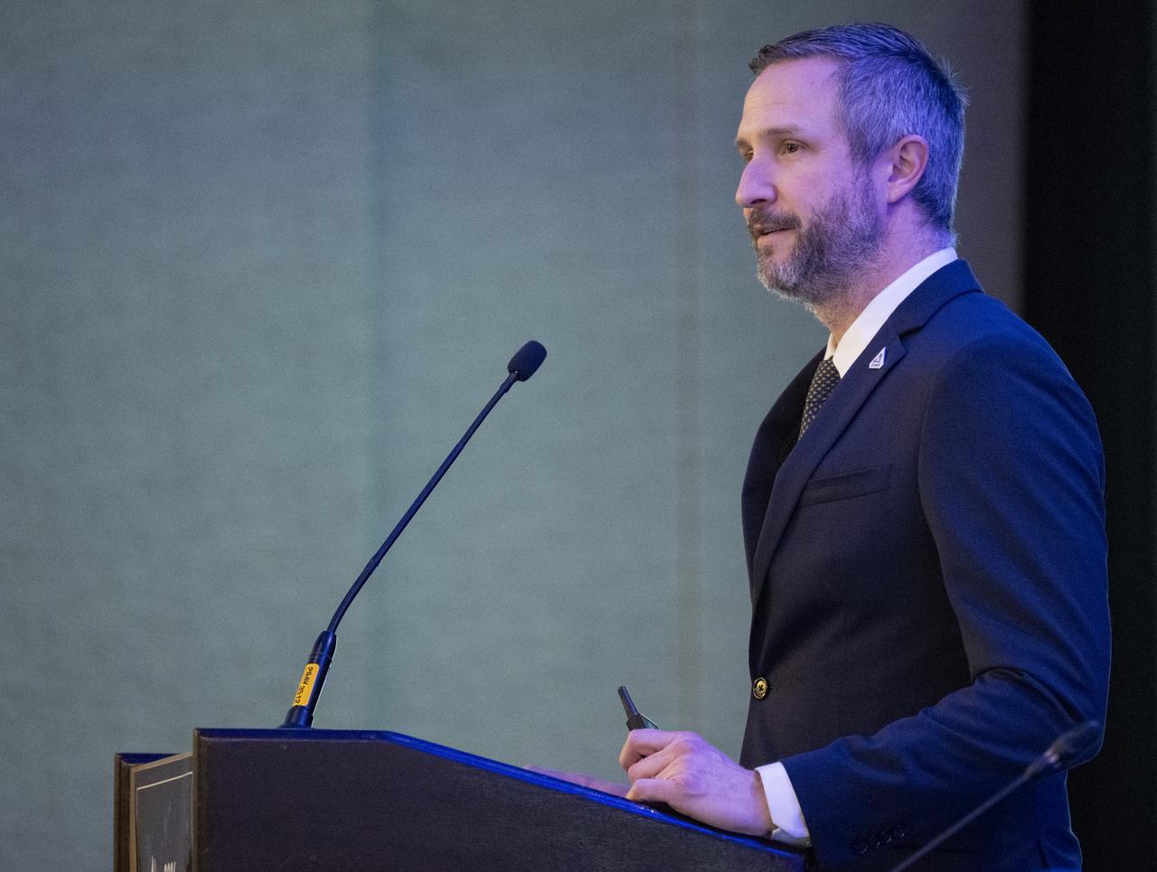 Jacob Bleacher, chief exploration scientist at NASA, speaks during the 2024 Artemis Suppliers Conference, Wednesday, Feb. 28, 2024, at the Grand Hyatt Hotel in Washington.  Photo Credit: (NASA/Joel Kowsky)