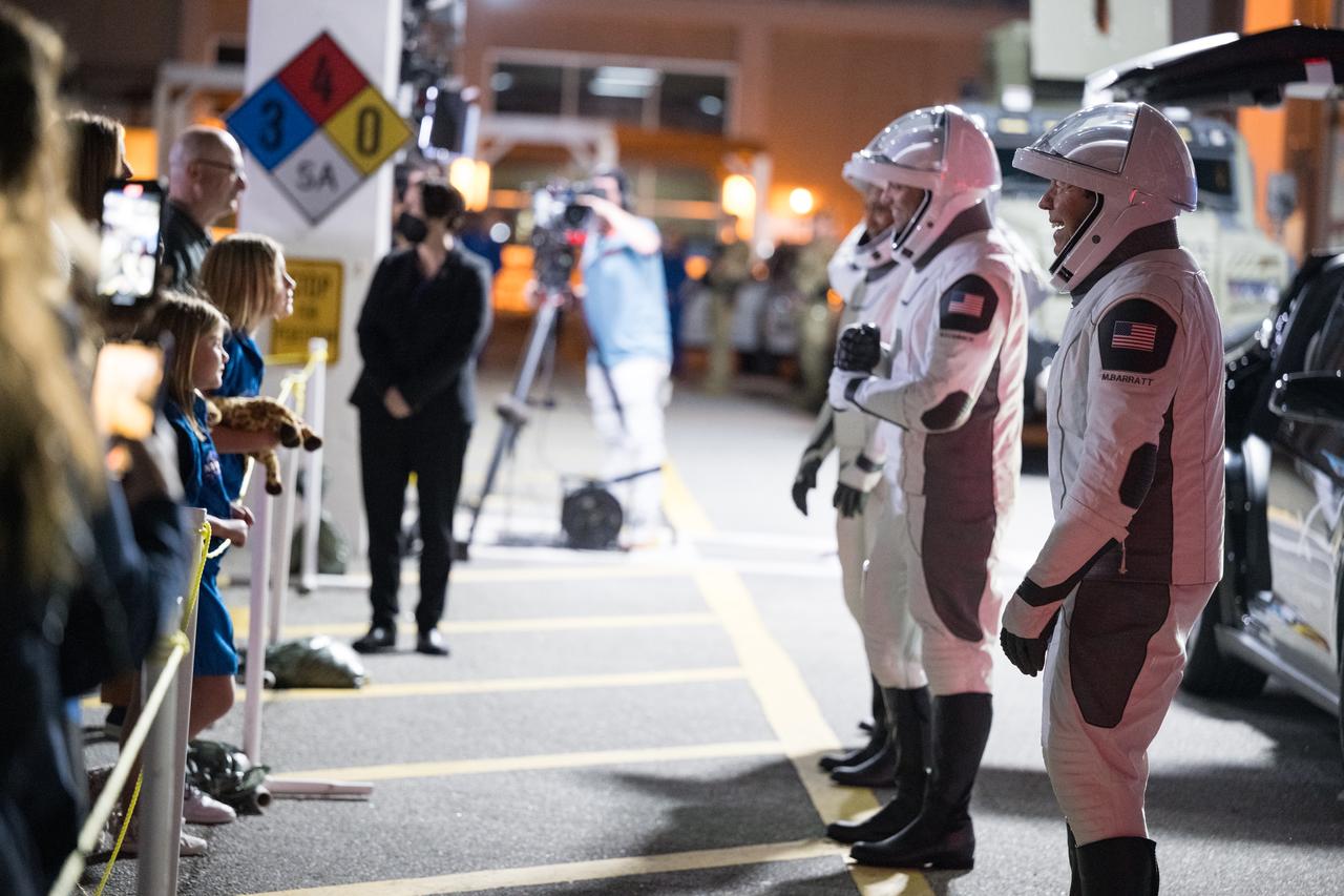 Roscosmos cosmonaut Alexander Grebenkin, NASA astronauts Jeanette Epps, Matthew Dominick, and Michael Barratt speak with family and friends as they prepare to depart the Neil A. Armstrong Operations and Checkout Building for Launch Complex 39A to board the SpaceX Dragon spacecraft for the Crew-8 mission launch, Sunday, March 3, 2024, at NASA’s Kennedy Space Center in Florida. NASA’s SpaceX Crew-8 mission is the eighth crew rotation mission of the SpaceX Crew Dragon spacecraft and Falcon 9 rocket to the International Space Station as part of the agency’s Commercial Crew Program. Dominick, Barratt, Epps, Grebenkin are scheduled to launch at 10:53 p.m. EST on Sunday, March 3, from Launch Complex 39A at the Kennedy Space Center. Photo Credit: (NASA/Aubrey Gemignani)