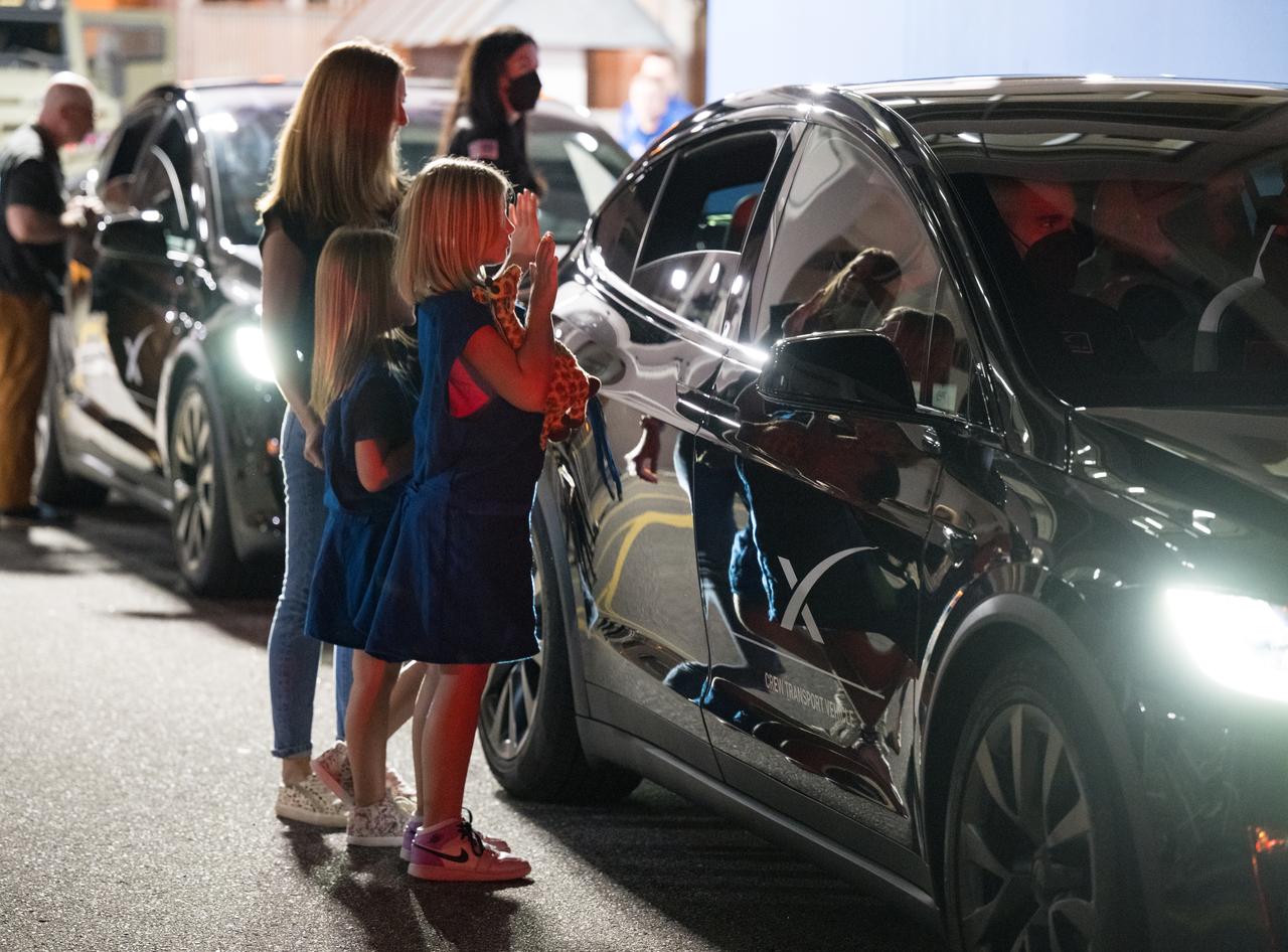 Family and friends gesture to NASA astronauts Matthew Dominick and Michael Barratt as they prepare to depart the Neil  A. Armstrong Operations and Checkout Building for Launch Complex 39A to board the SpaceX Dragon spacecraft for the Crew-8 mission launch, Sunday, March 3, 2024, at NASA’s Kennedy Space Center in Florida. NASA’s SpaceX Crew-8 mission is the eighth crew rotation mission of the SpaceX Crew Dragon spacecraft and Falcon 9 rocket to the International Space Station as part of the agency’s Commercial Crew Program. NASA astronauts Dominick, Barratt, Jeanette Epps, and Roscosmos cosmonaut Alexander Grebenkin are scheduled to launch at 10:53 p.m. EST on Sunday, March 3, from Launch Complex 39A at the Kennedy Space Center.  Photo Credit: (NASA/Aubrey Gemignani)
