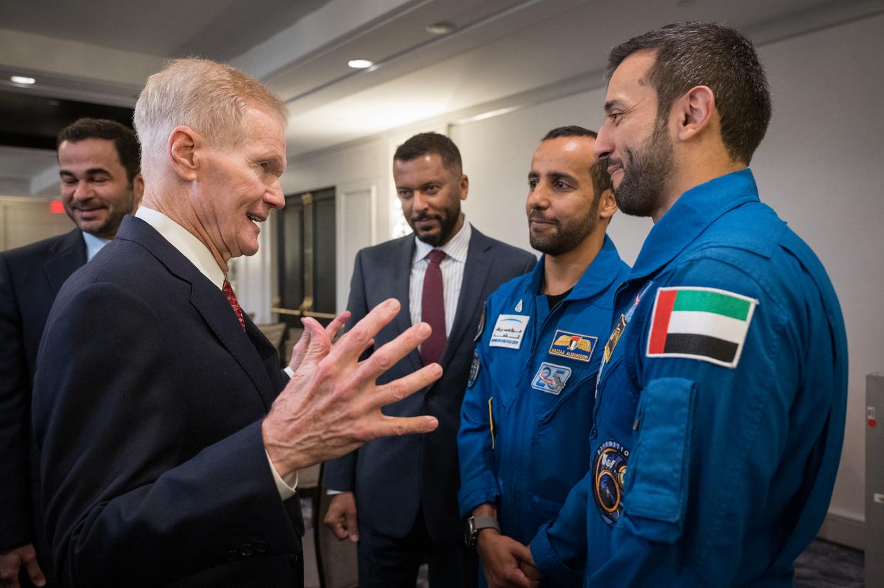 NASA Administrator Bill Nelson, left,  Speaks with UAE astronaut Hazza Al Mansouri, and UAE astronaut and Minister of Youth, H.E. Dr. Sultan Al Neyad, right, during an event celebrating UAE-US collaboration in space, Friday, March 8, 2024, at the Four Seasons Hotel in Washington. Photo Credit: (NASA/Bill Ingalls)