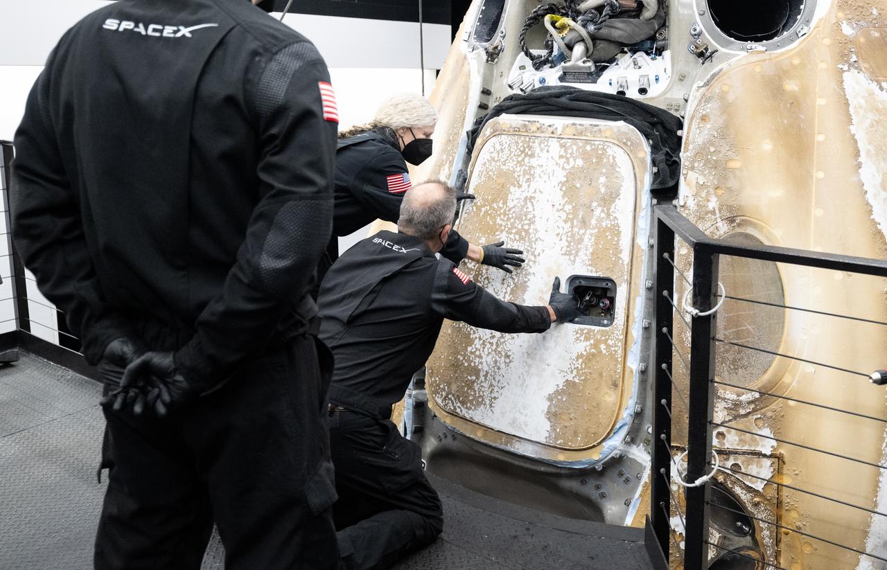 Support teams onboard the SpaceX recovery ship MEGAN work to open the hatch of the SpaceX Dragon Endurance spacecraft shortly after it landed with NASA astronaut Jasmin Moghbeli, ESA (European Space Agency) astronaut Andreas Mogensen, Japan Aerospace Exploration Agency (JAXA) astronaut Satoshi Furukawa, and Roscosmos cosmonaut Konstantin Borisov aboard in the Gulf of Mexico off the coast of Pensacola, Florida, Tuesday, March 12, 2024. Moghbeli, Mogensen, Furukawa, and Borisov are returning after nearly six-months in space as part of Expedition 70 aboard the International Space Station. Photo Credit: (NASA/Joel Kowsky)