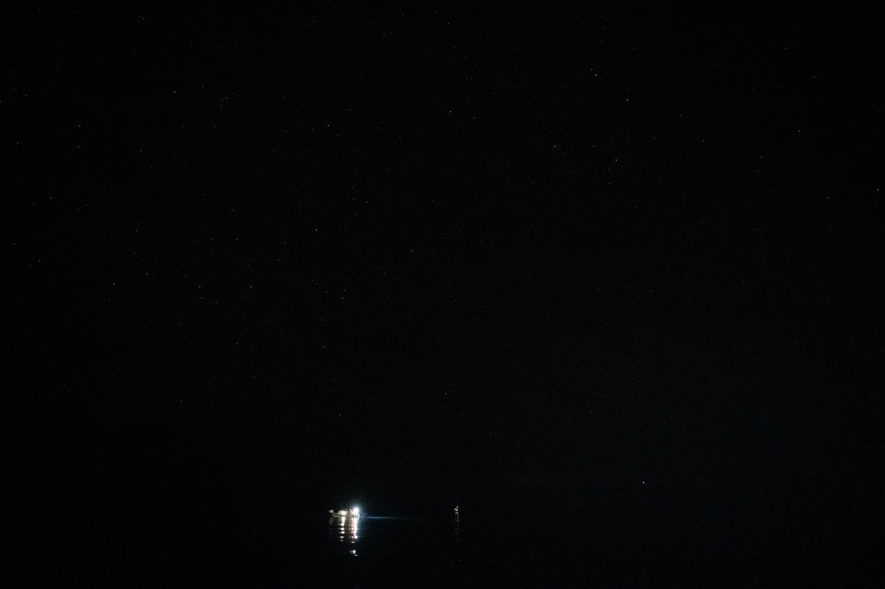 A fast boat is seen with members of the SpaceX support team is seen after being deployed from the SpaceX recovery ship MEGAN in the Gulf of Mexico as the recovery team prepares for the landing of the SpaceX Dragon spacecraft with NASA astronaut Jasmin Moghbeli, ESA (European Space Agency) astronaut Andreas Mogensen, Japan Aerospace Exploration Agency (JAXA) astronaut Satoshi Furukawa, and Roscosmos cosmonaut Konstantin Borisov aboard, Tuesday, March 12, 2024, off the coast of Pensacola, Florida. Moghbeli, Mogensen, Furukawa, and Borisov are returning after nearly six-months days in space as part of Expedition 70 aboard the International Space Station. Photo Credit: (NASA/Joel Kowsky)