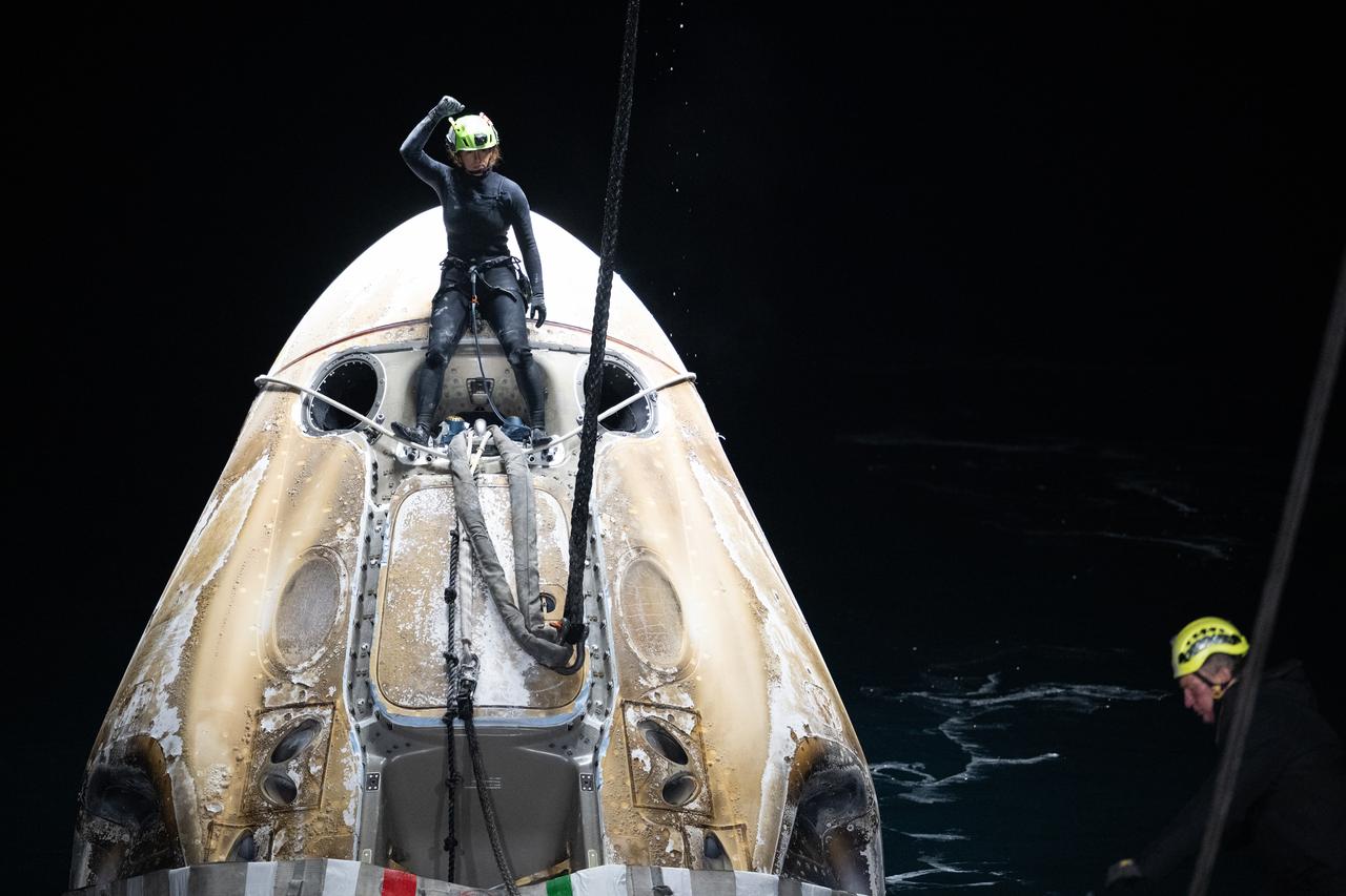 Support teams work around the SpaceX Dragon Endurance spacecraft shortly after it landed with NASA astronaut Jasmin Moghbeli, ESA (European Space Agency) astronaut Andreas Mogensen, Japan Aerospace Exploration Agency (JAXA) astronaut Satoshi Furukawa, and Roscosmos cosmonaut Konstantin Borisov aboard in the Gulf of Mexico off the coast of Pensacola, Florida, Tuesday, March 12,2024. Moghbeli, Mogensen, Furukawa, and Borisov are returning after nearly six-months in space as part of Expedition 70 aboard the International Space Station. Photo Credit: (NASA/Joel Kowsky)