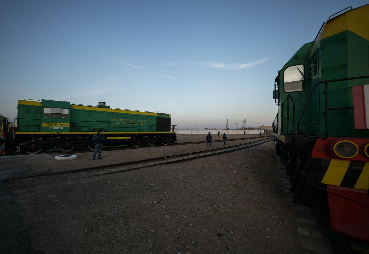 Russian security teams prepare for the Soyuz rocket to be rolled out by train to the launch pad at Site 31, Monday, March 18, 2024, at the Baikonur Cosmodrome in Kazakhstan. Expedition 71 NASA astronaut Tracy Dyson, Roscosmos cosmonaut Oleg Novitskiy, and Belarus spaceflight participant Marina Vasilevskaya are scheduled to launch aboard their Soyuz MS-25 spacecraft on March 21. Photo Credit: (NASA/Bill Ingalls)